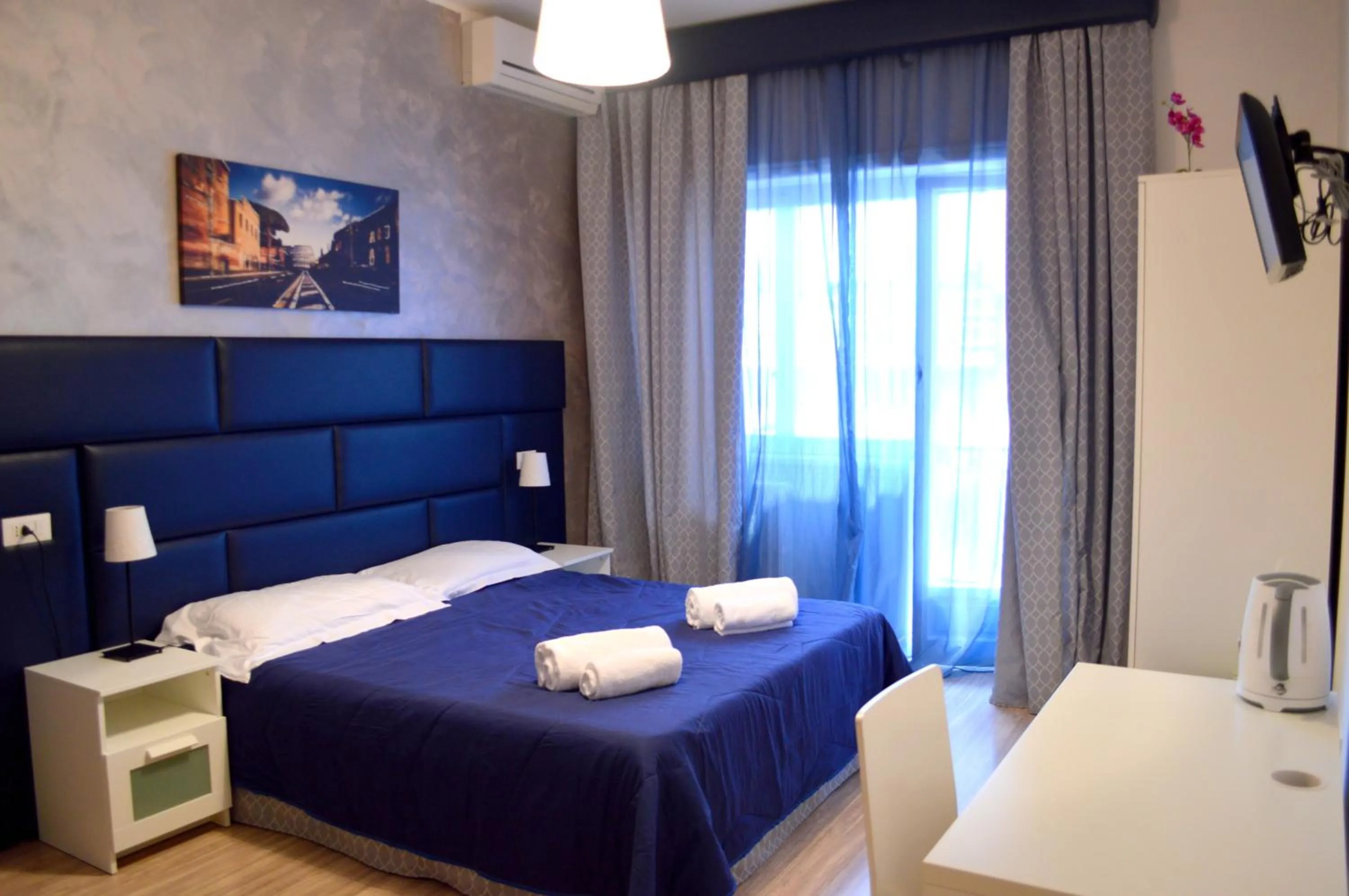 Photo of the whole room, Bed in Check-Inn Rooms