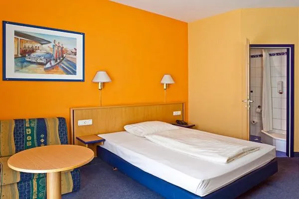 Bed in Hotel Strohofer