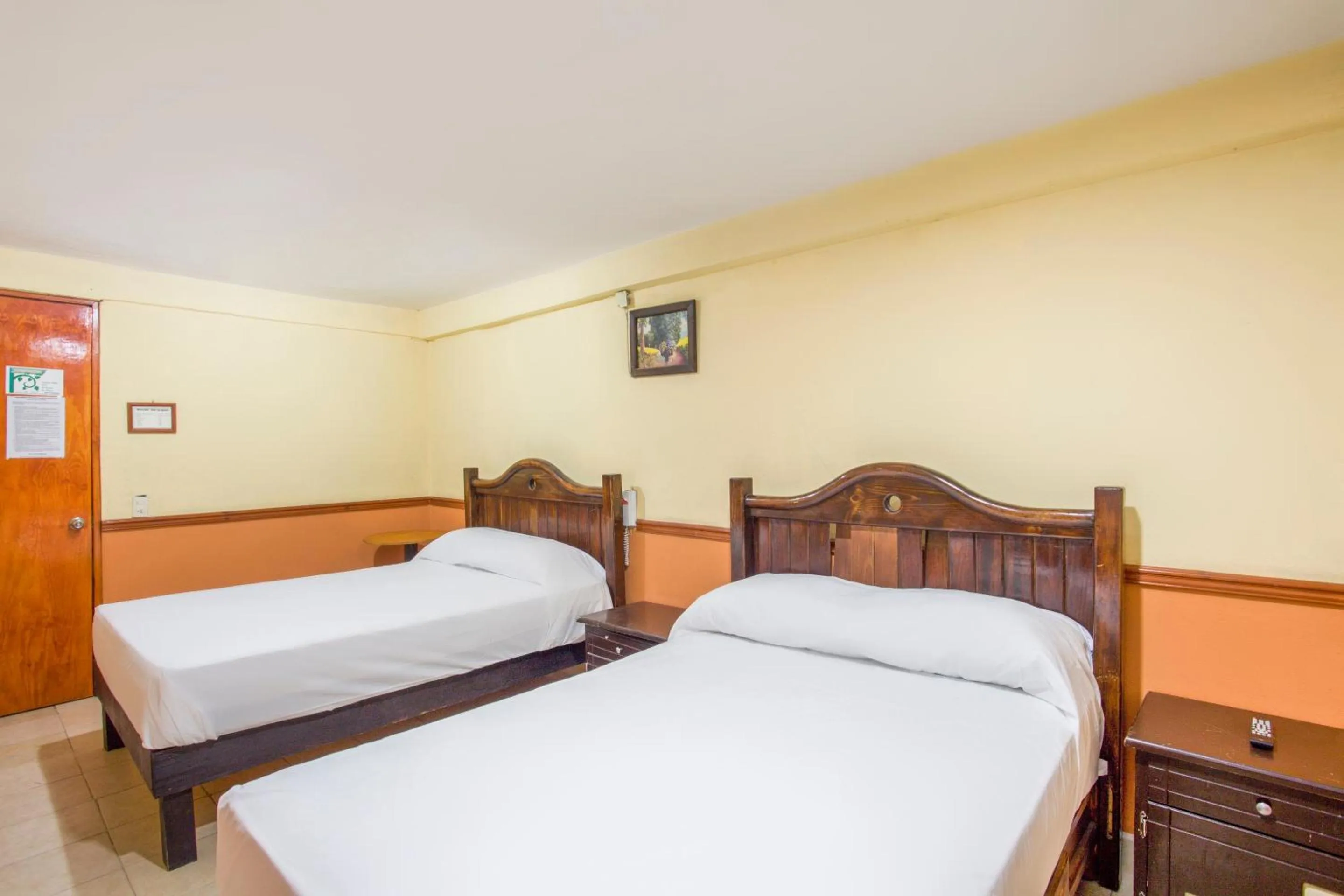 Bedroom, Bed in OYO Hotel San Agustin