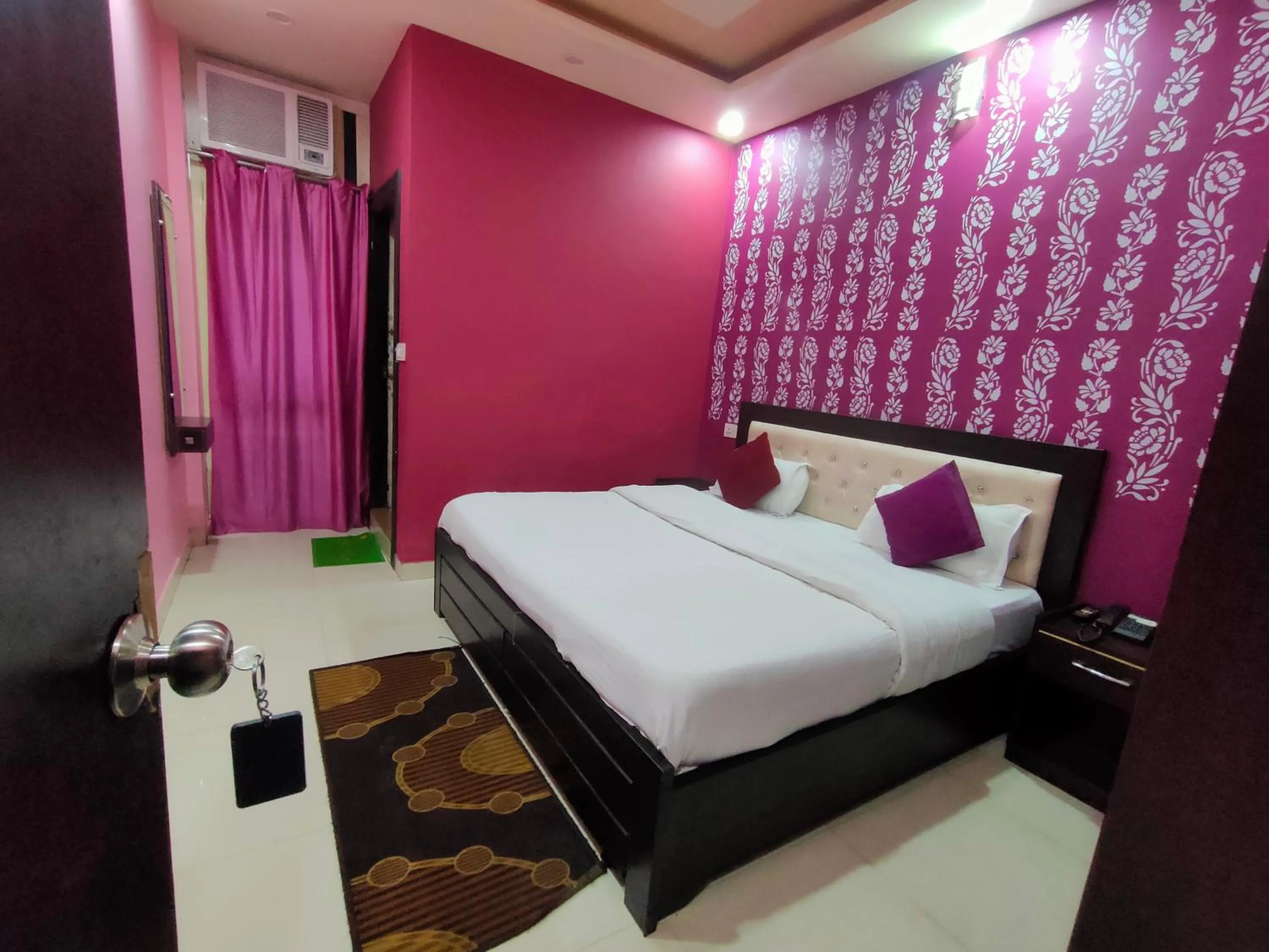 Bed in Hotel Dev Bhoomi Inn