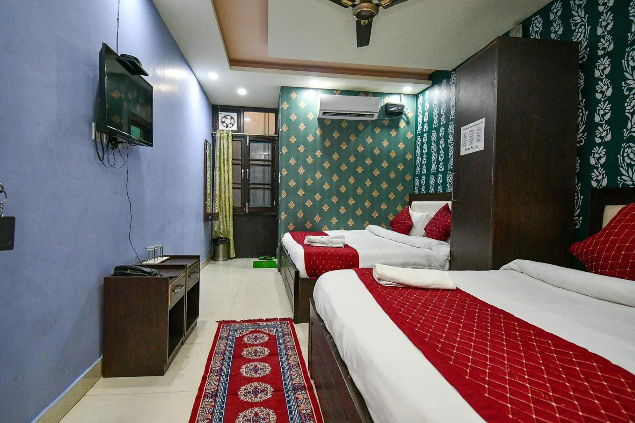 Bed in Hotel Dev Bhoomi Inn