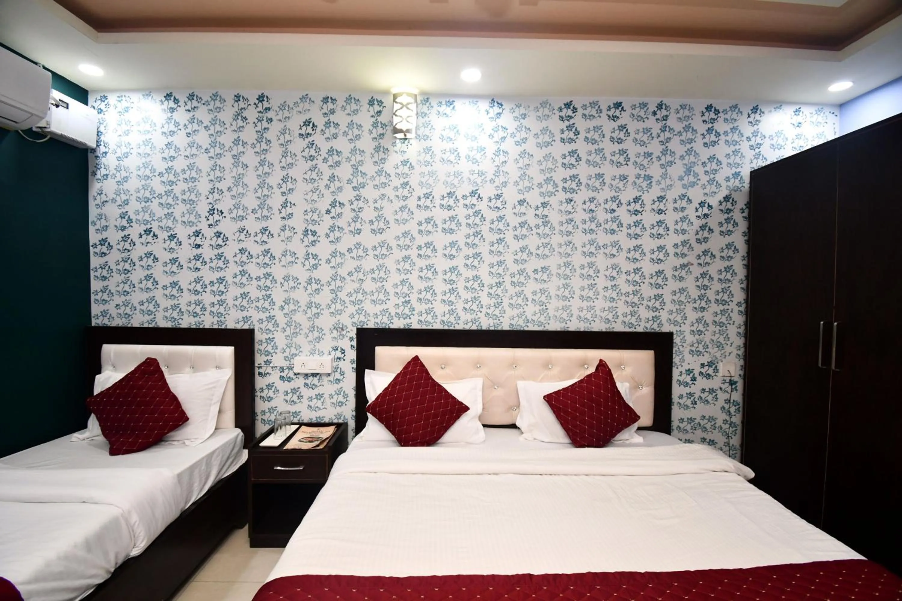 Bed in Hotel Dev Bhoomi Inn