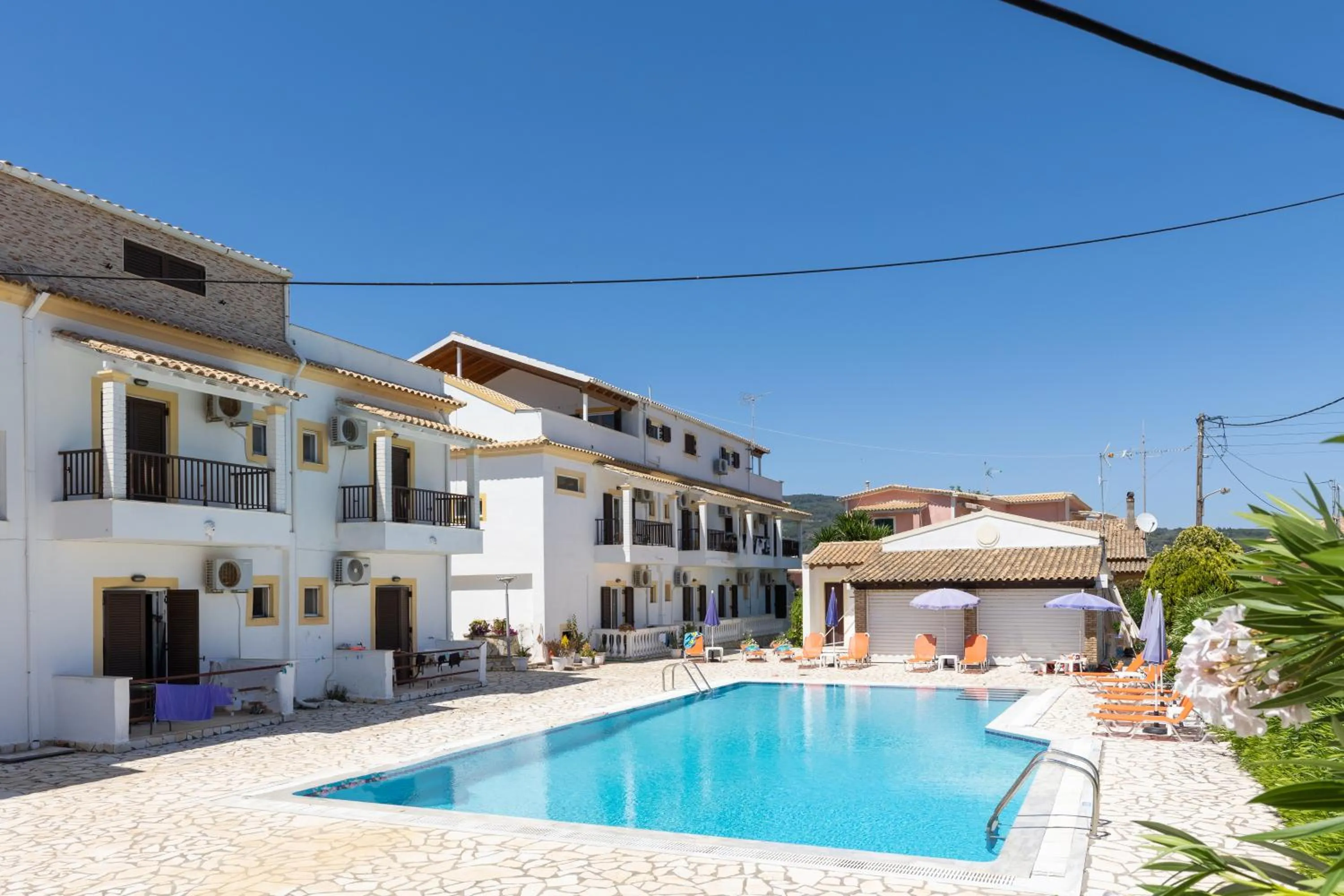 Property building in Dora Pool Studios by Konnect,150m from the Beach