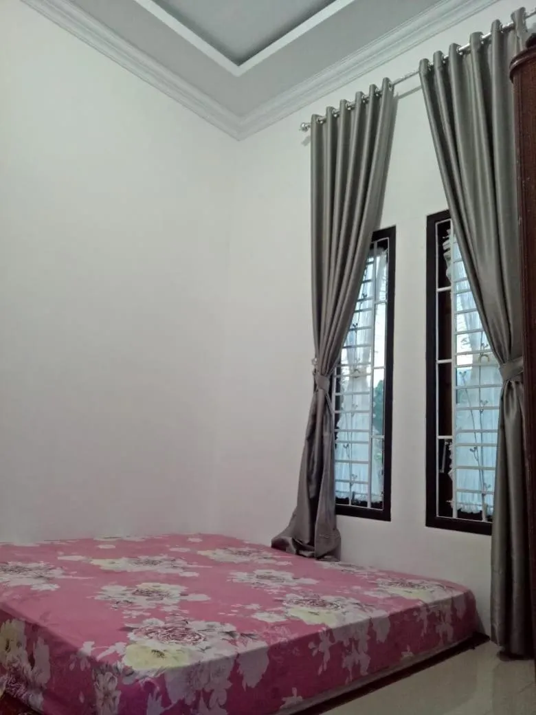 Bed in Villa SINGGALANG Syariah