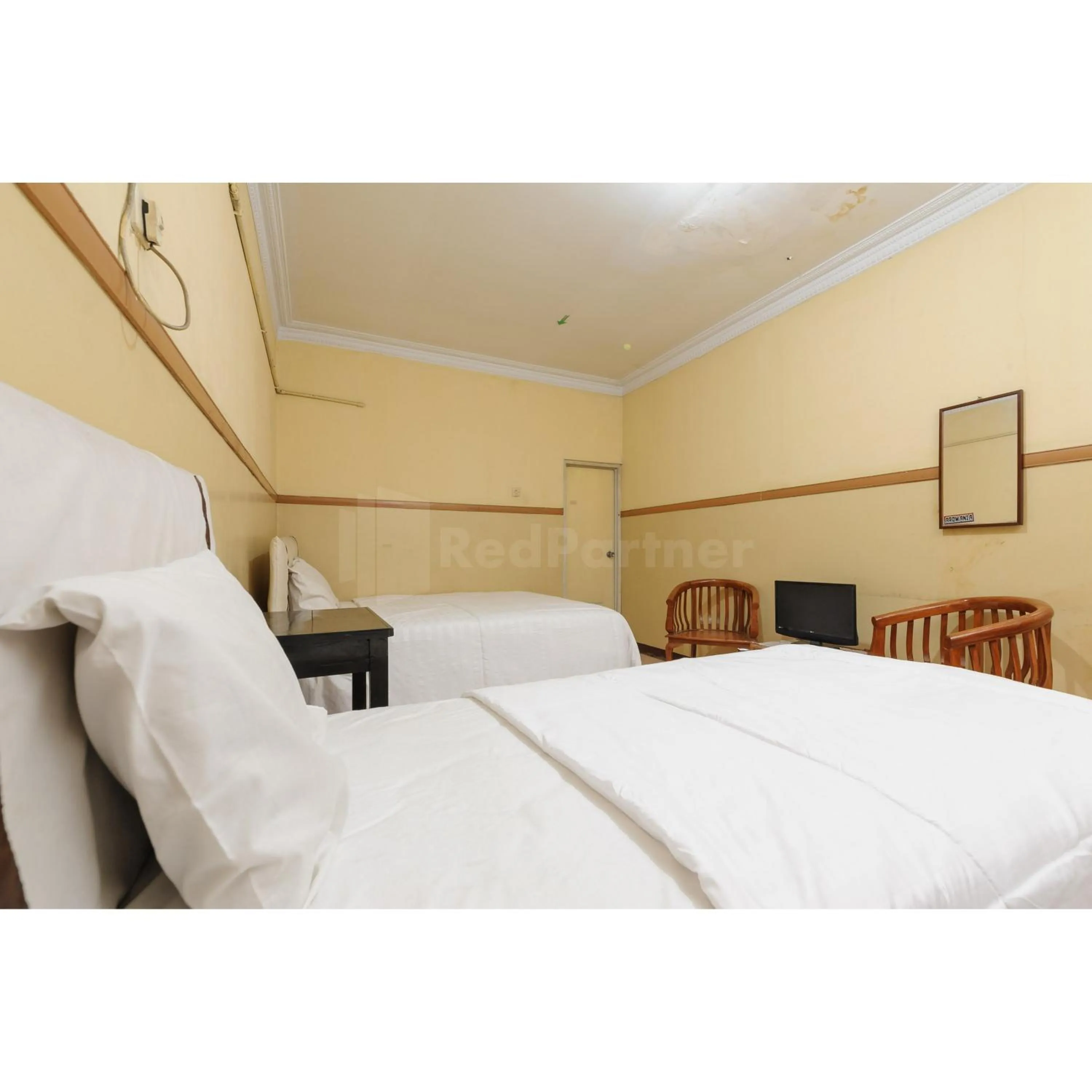 Bedroom, Bed in Hotel Al Hakim Syariah Redpartner