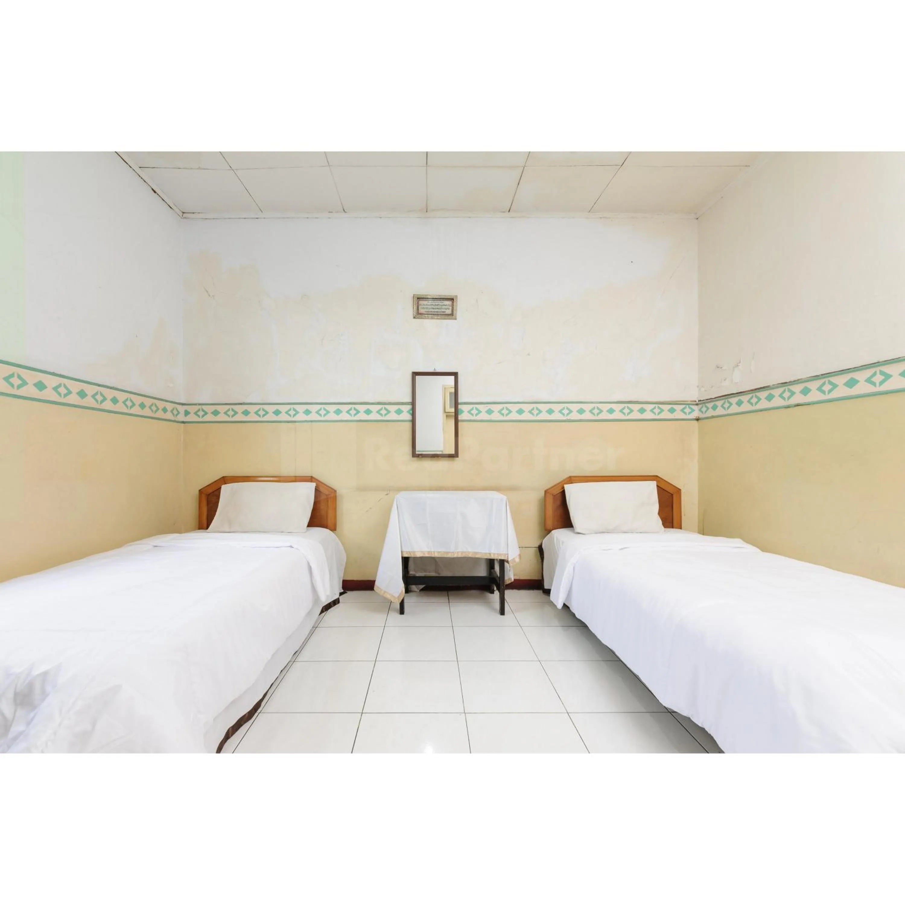 Bedroom, Bed in Hotel Al Hakim Syariah Redpartner