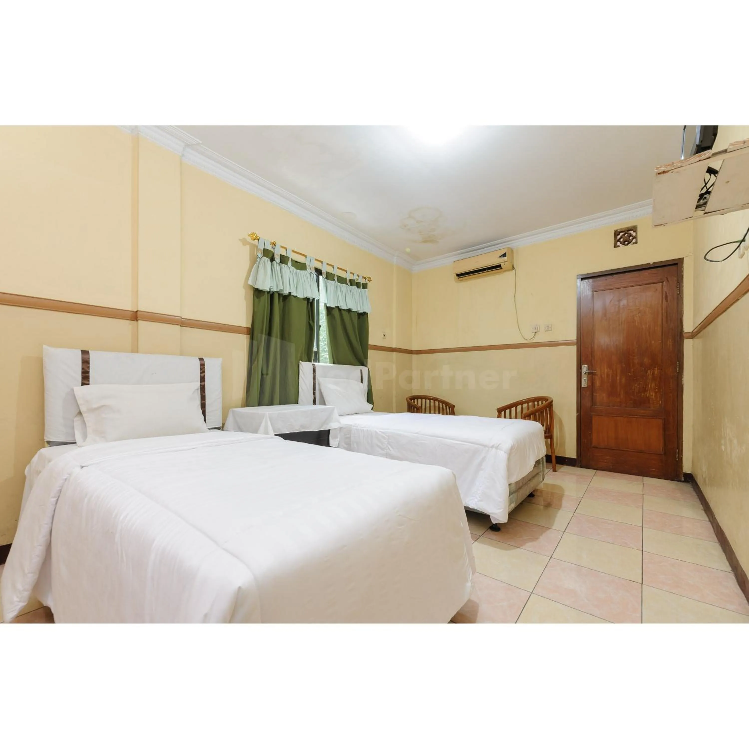 Bedroom, Bed in Hotel Al Hakim Syariah Redpartner