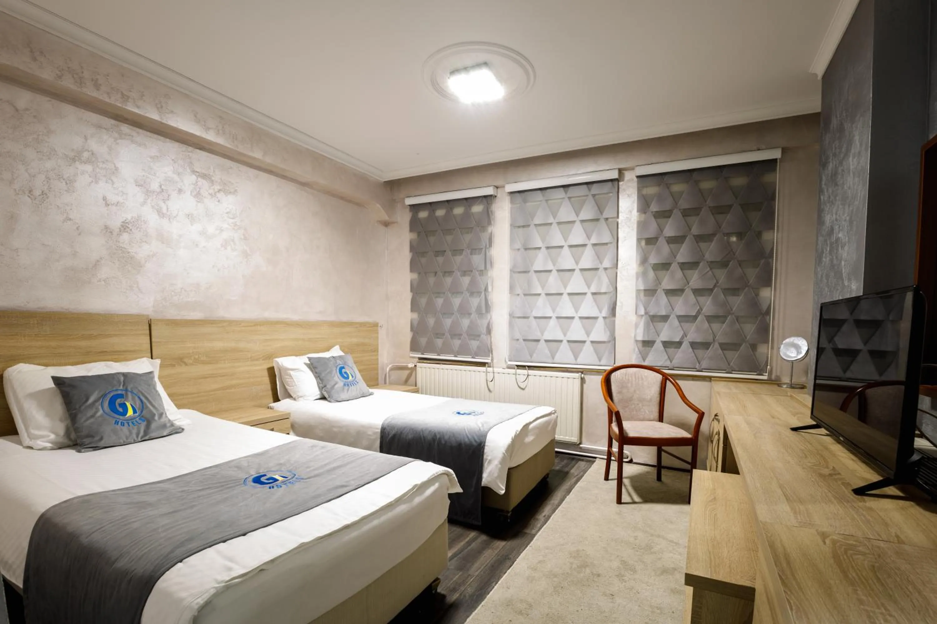 Bedroom in Skopje G Hotels