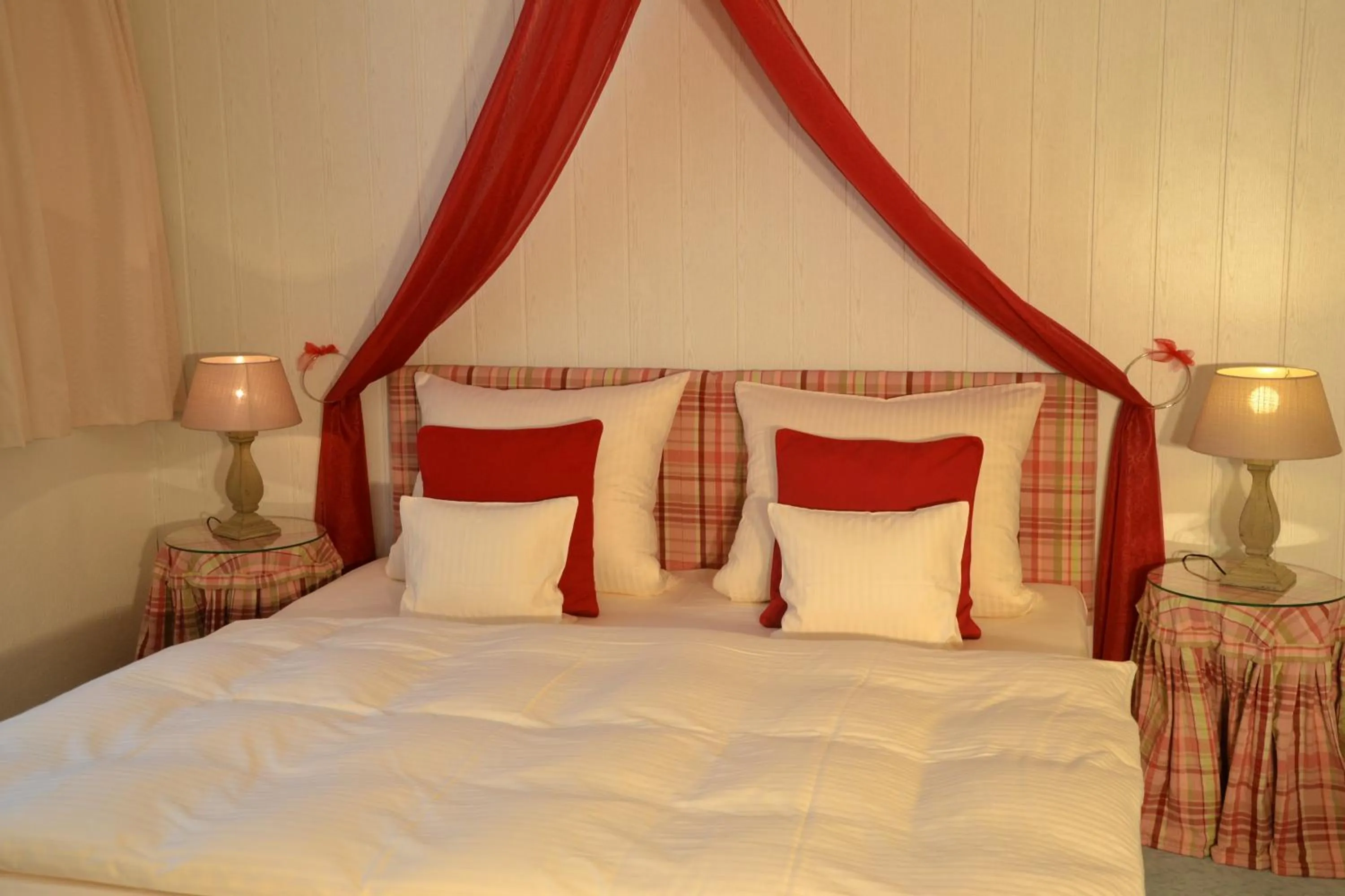 Bed in Christian Gartenhotel