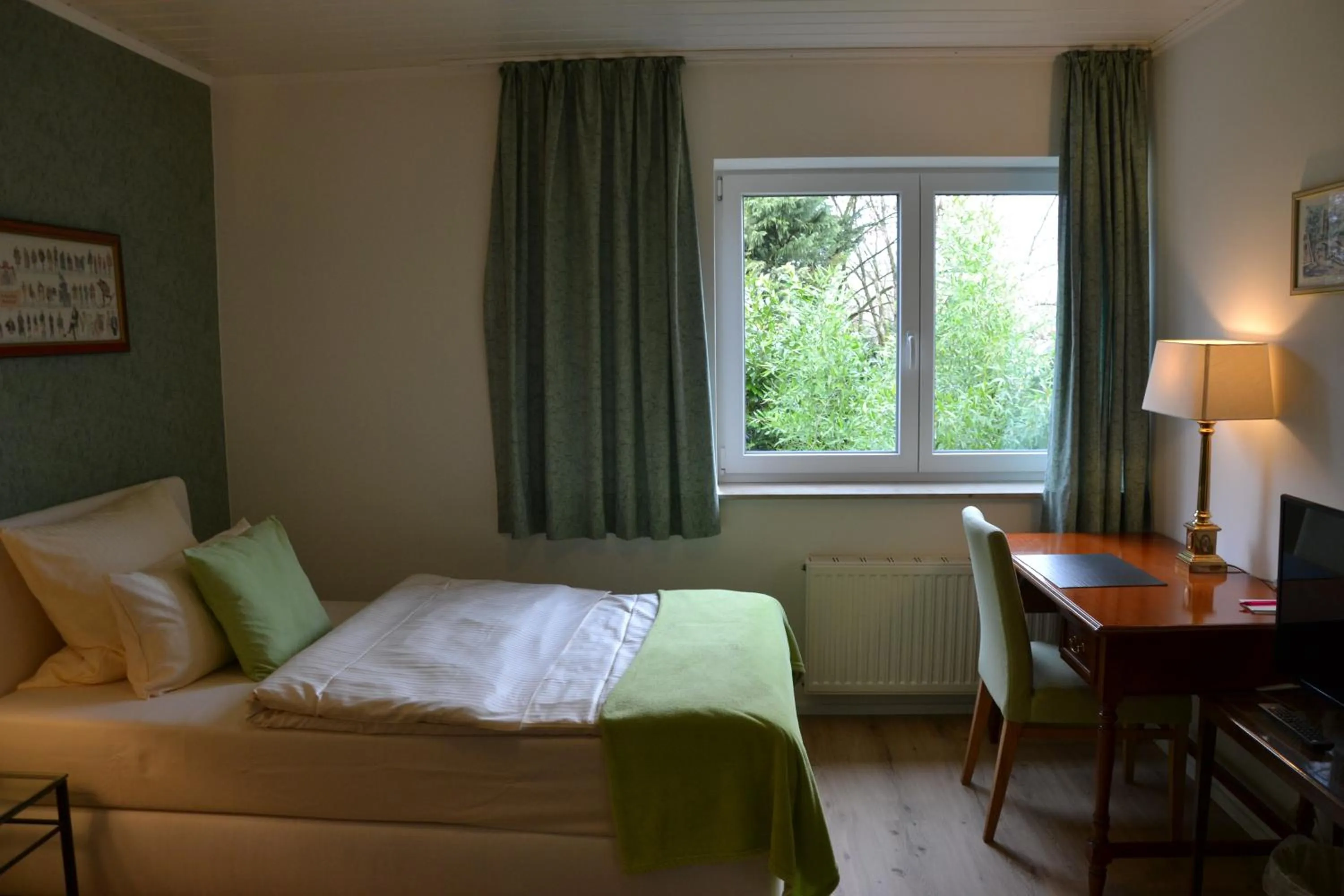 Bed in Christian Gartenhotel