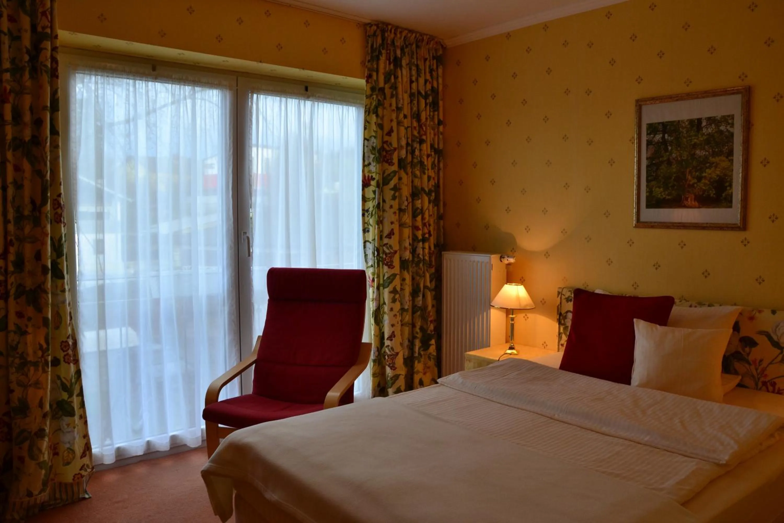 Bed in Christian Gartenhotel