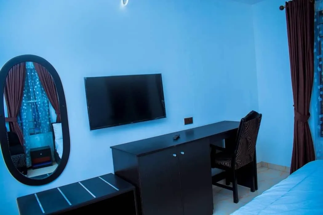 Bed in Mexiloyd Luxury Rooms & Suites