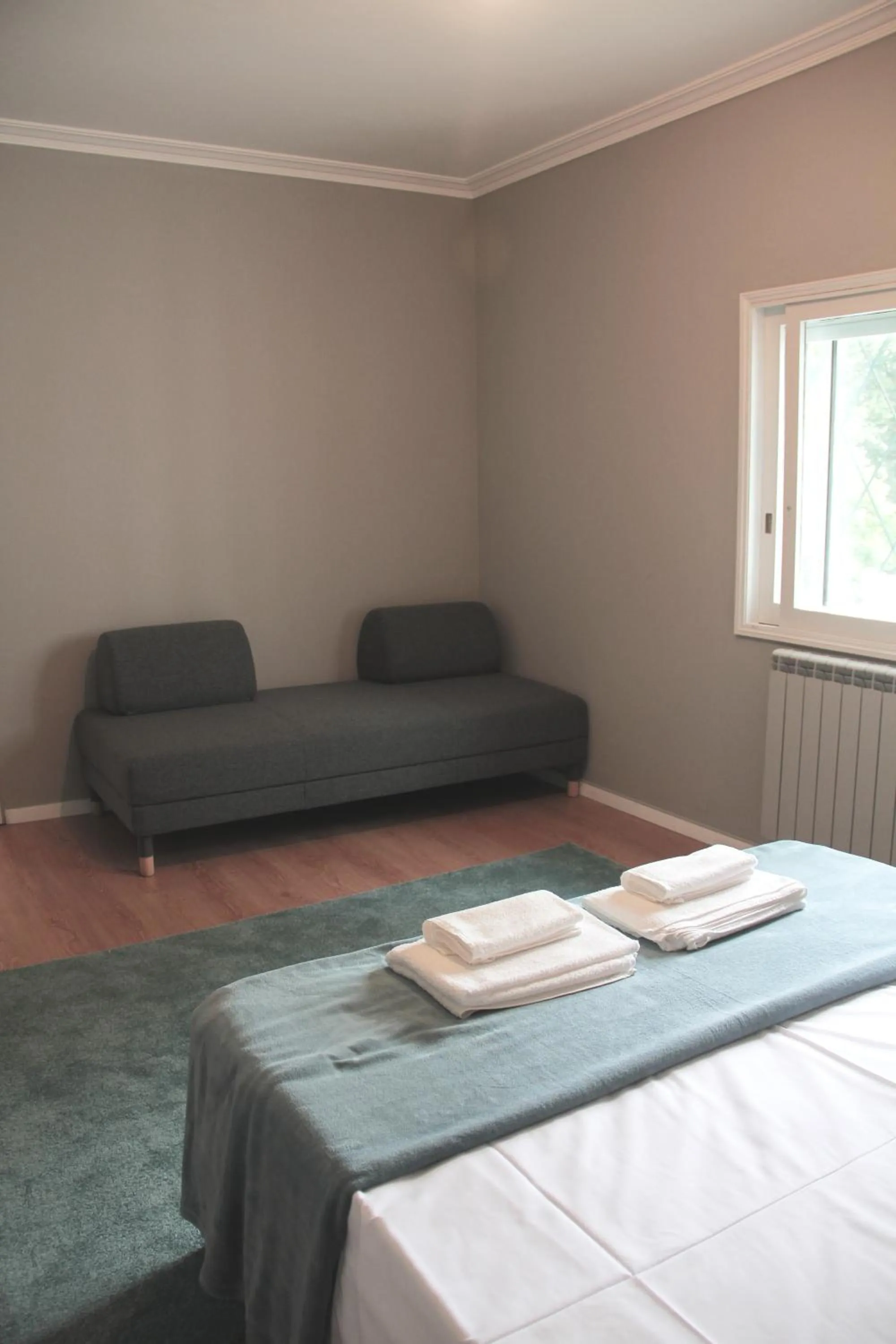 Bed in Genius Loci Guesthouse