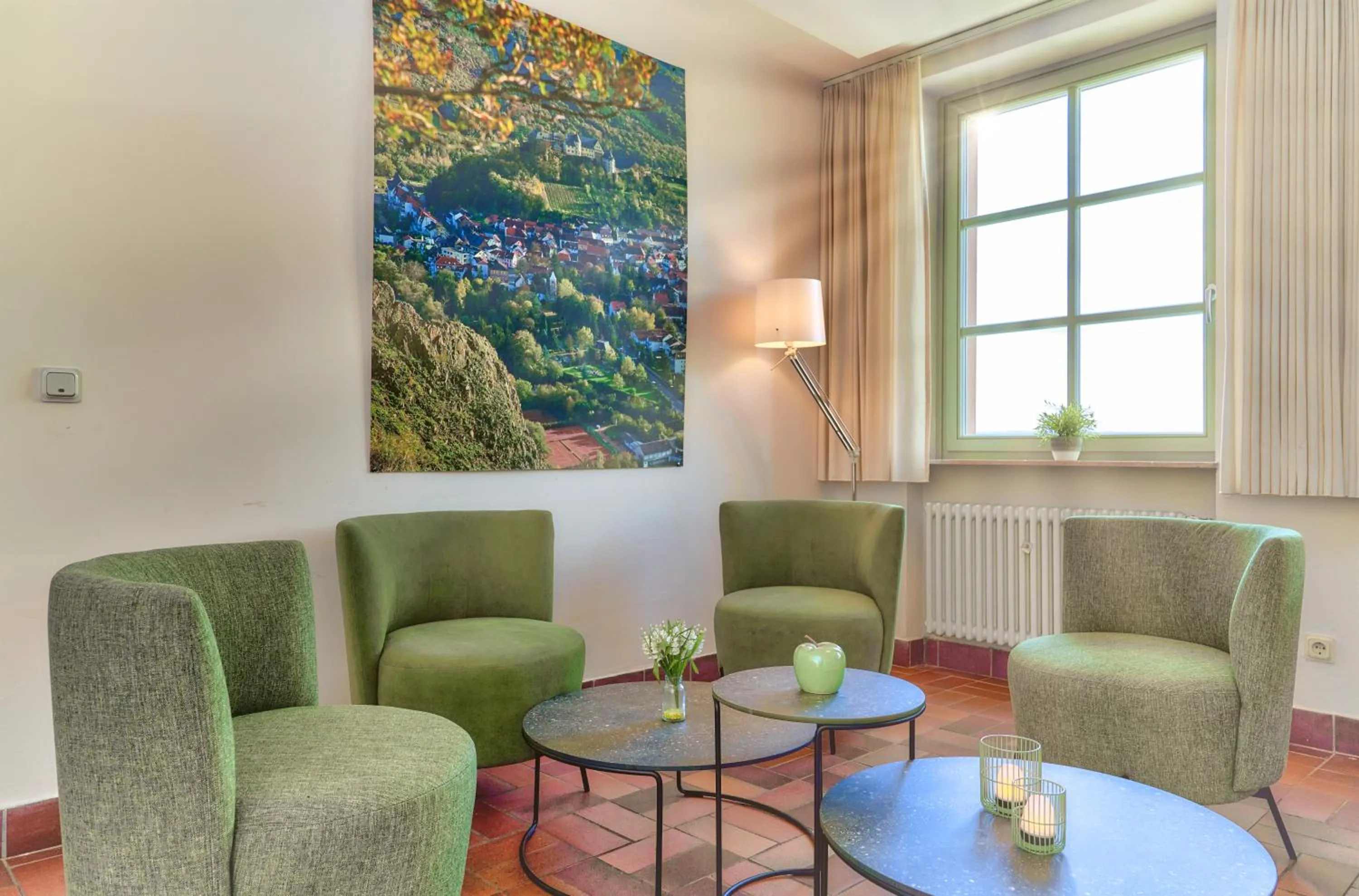 Communal lounge/ TV room in Ev.Familienferien-und Bildungsstätte Ebernburg