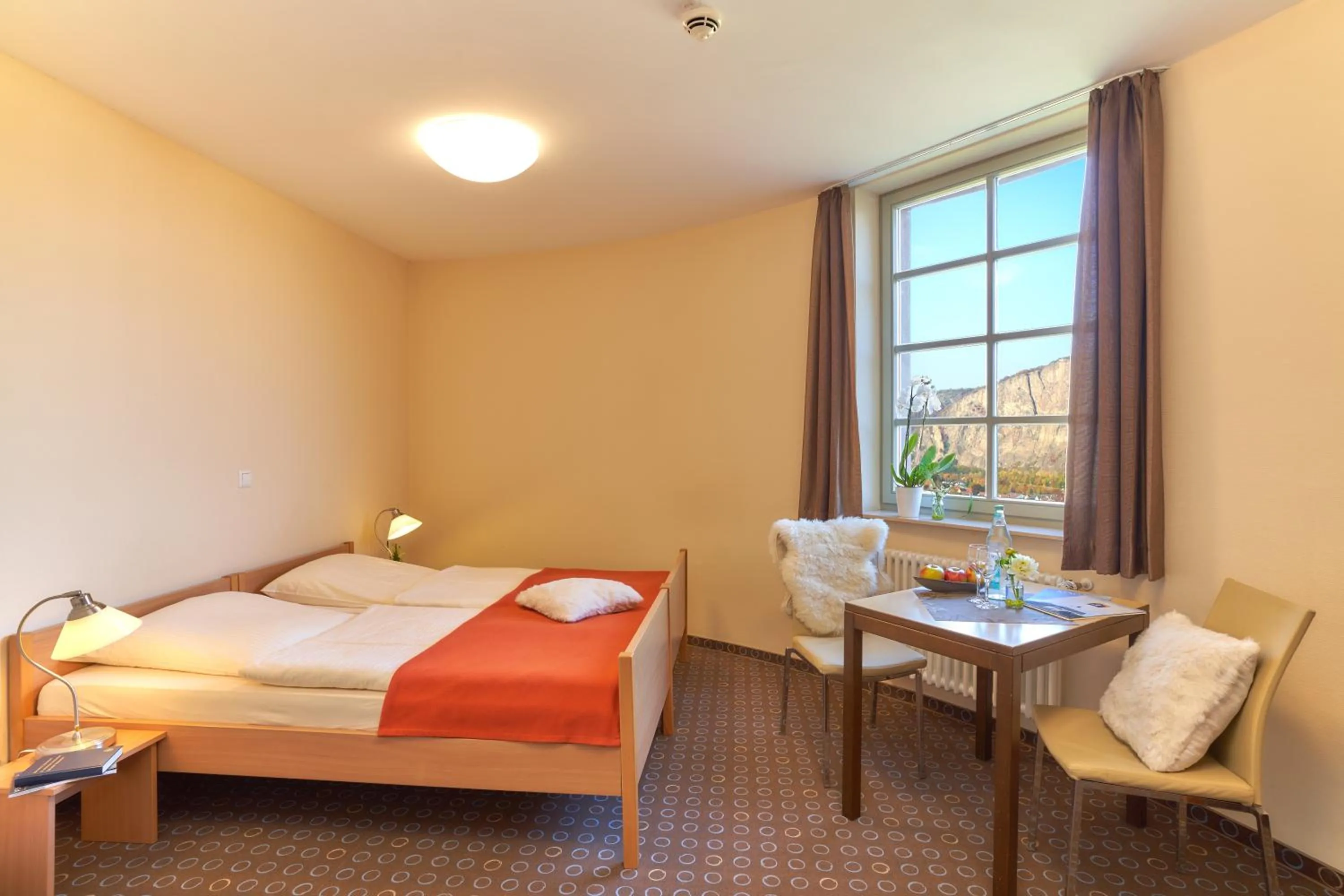 Photo of the whole room, Bed in Ev.Familienferien-und Bildungsstätte Ebernburg