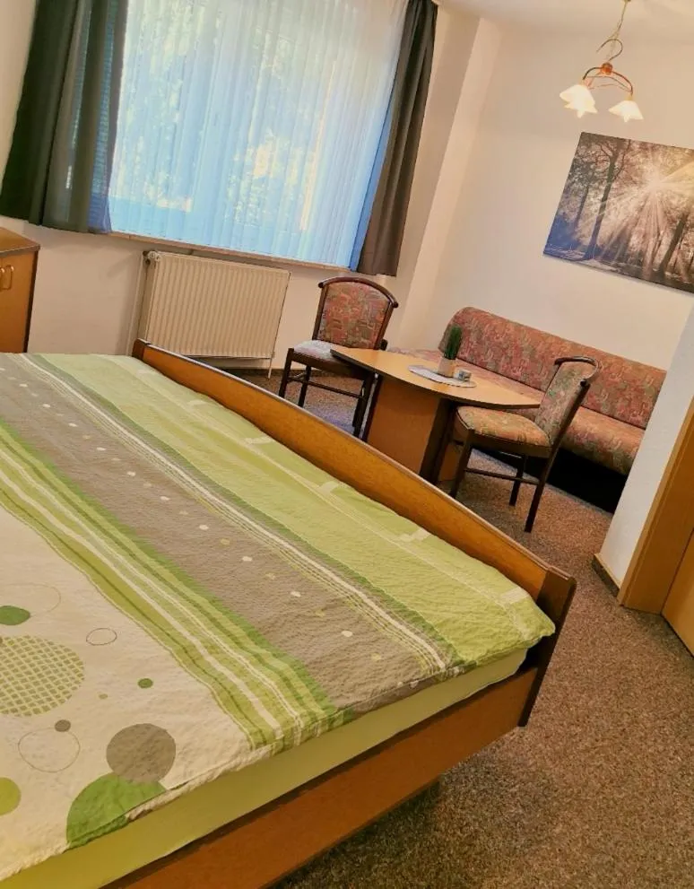 Photo of the whole room, Bed in Landhotel Heidkrug