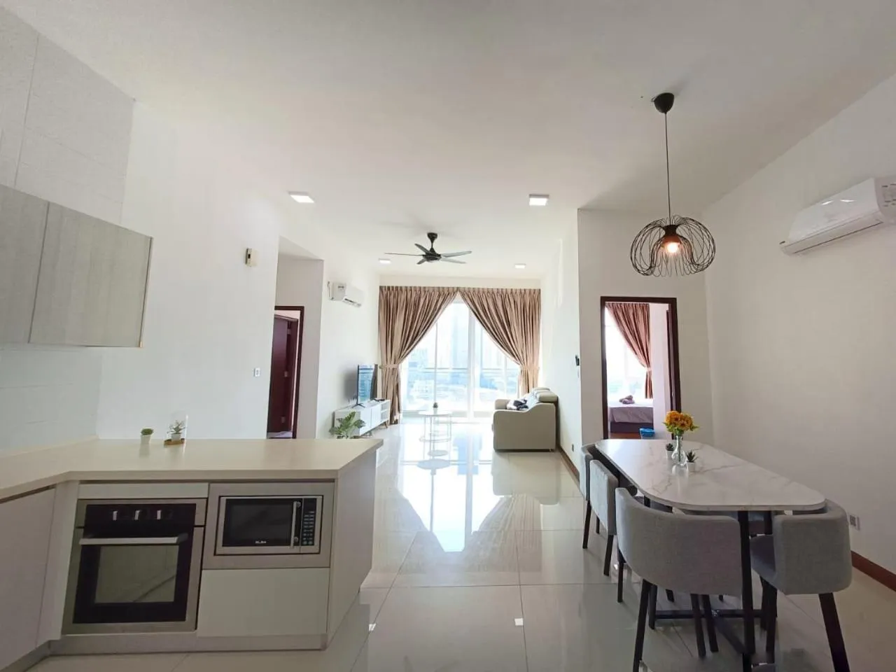 Dining area in Paragon Suite Homestay by Antlerzone