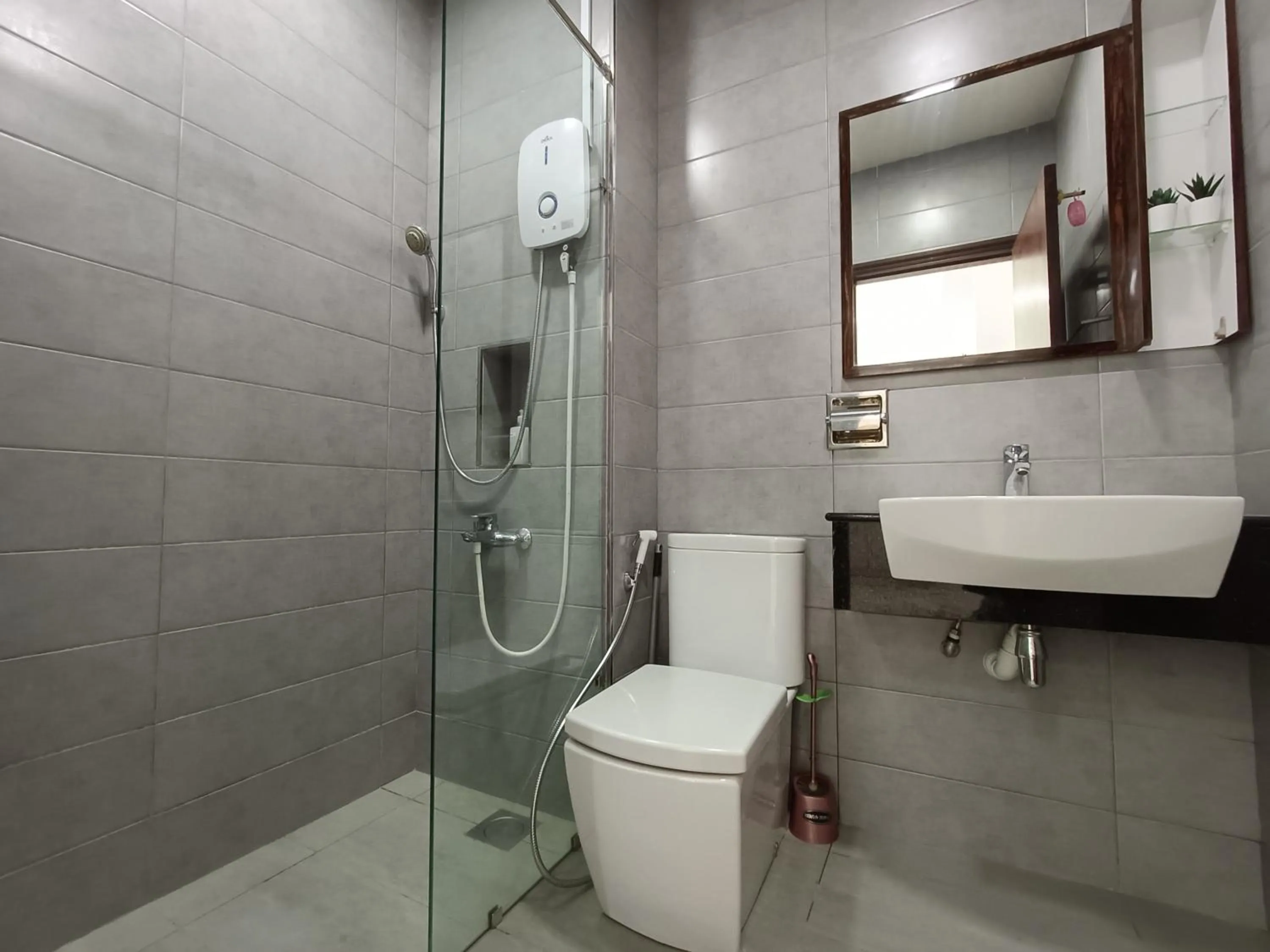 Bathroom in Paragon Suite Homestay by Antlerzone