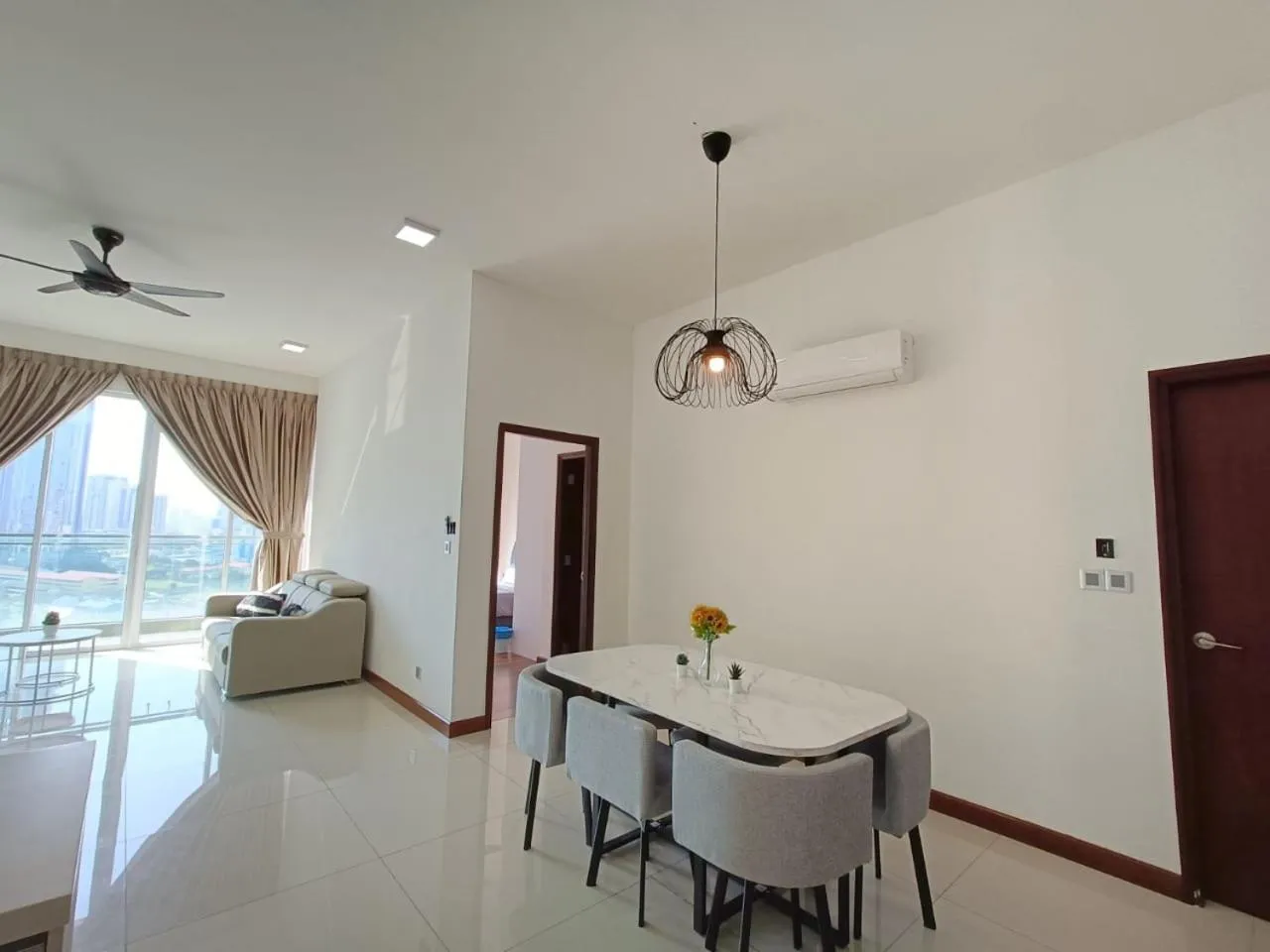 Dining area in Paragon Suite Homestay by Antlerzone