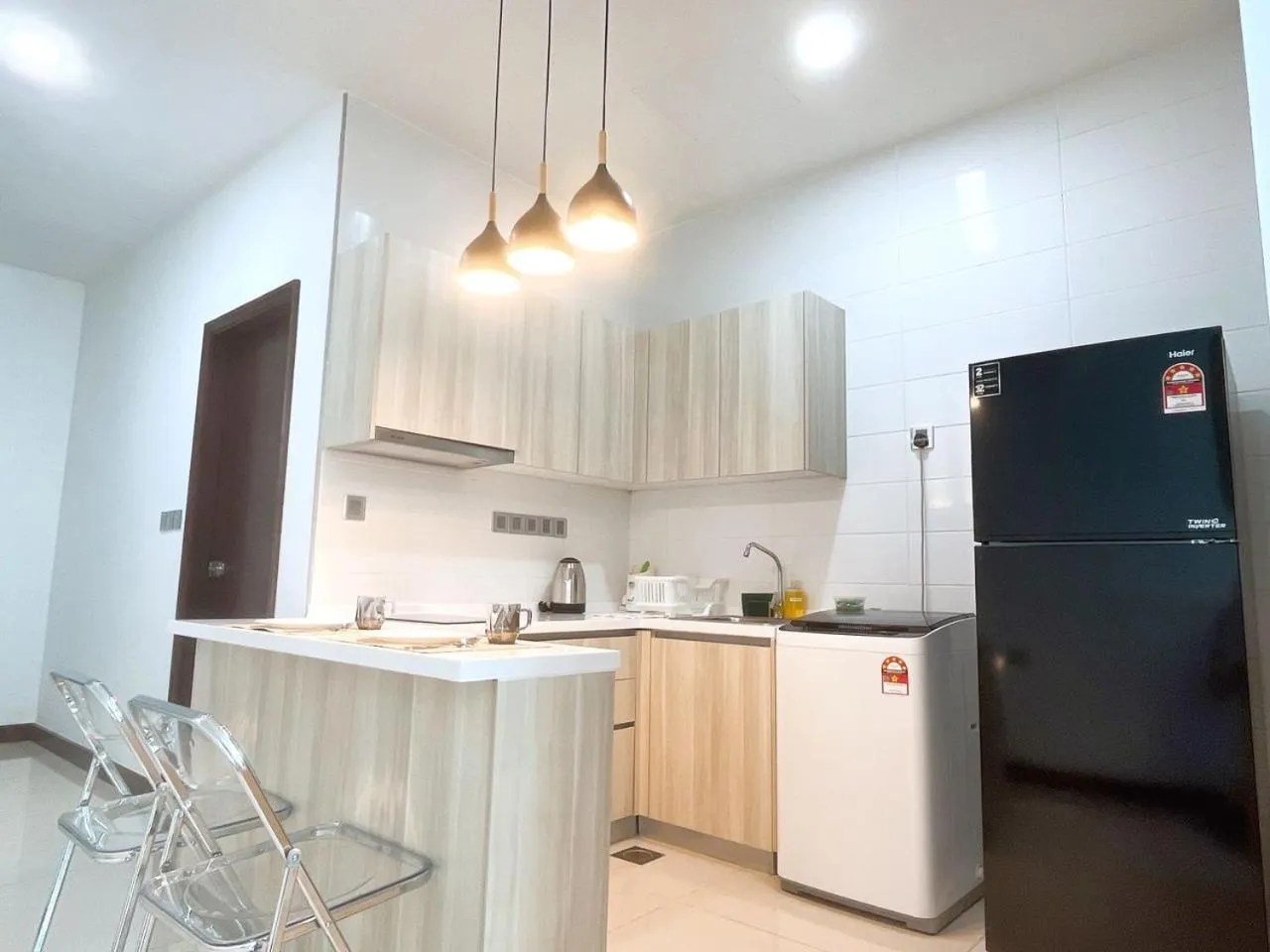 Kitchen or kitchenette in Paragon Suite Homestay by Antlerzone