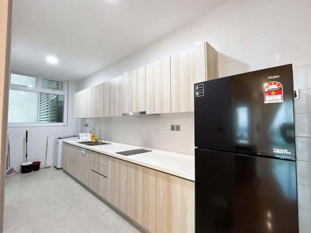 Kitchen or kitchenette in Paragon Suite Homestay by Antlerzone
