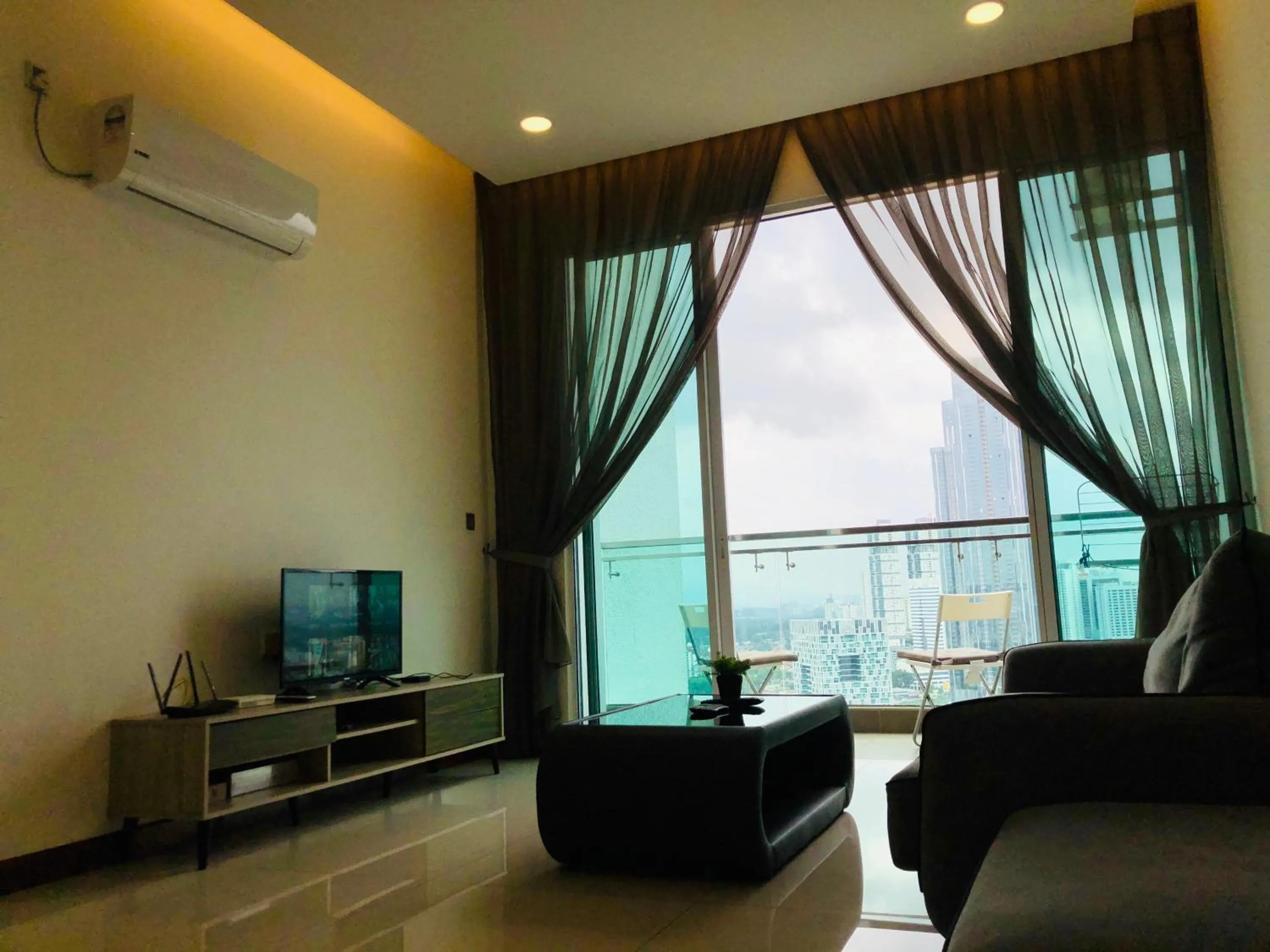 Living room in Paragon Suite Homestay by Antlerzone