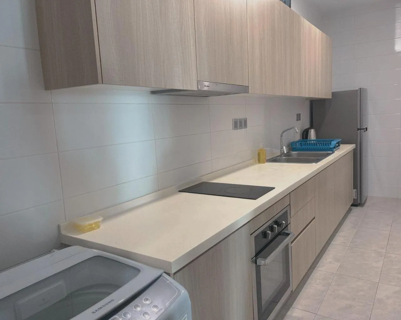 Kitchen or kitchenette in Paragon Suite Homestay by Antlerzone