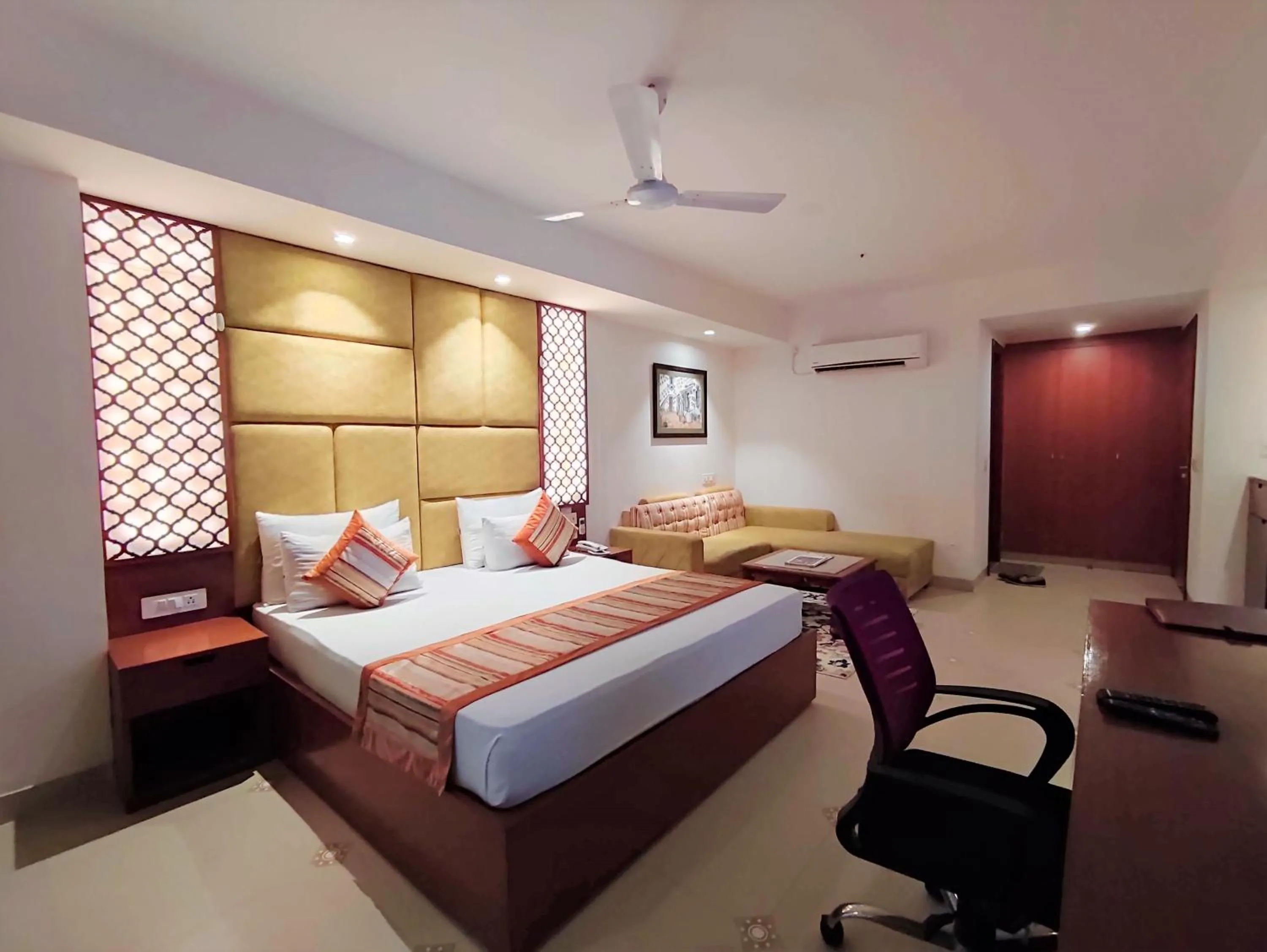 Photo of the whole room, Bed in The Angel Hotel & Suites near Medanta