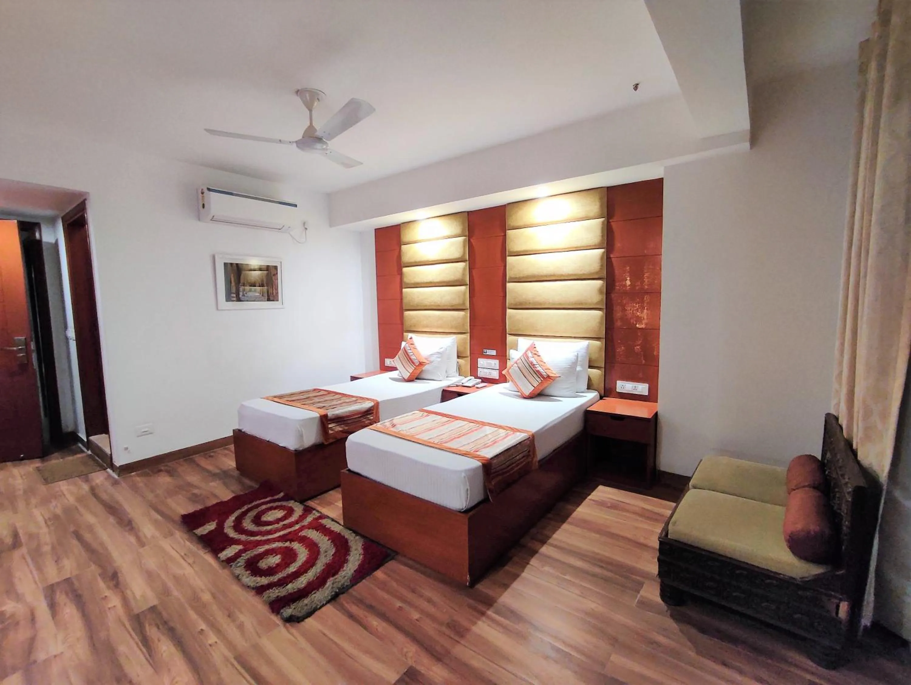 Photo of the whole room, Bed in The Angel Hotel & Suites near Medanta
