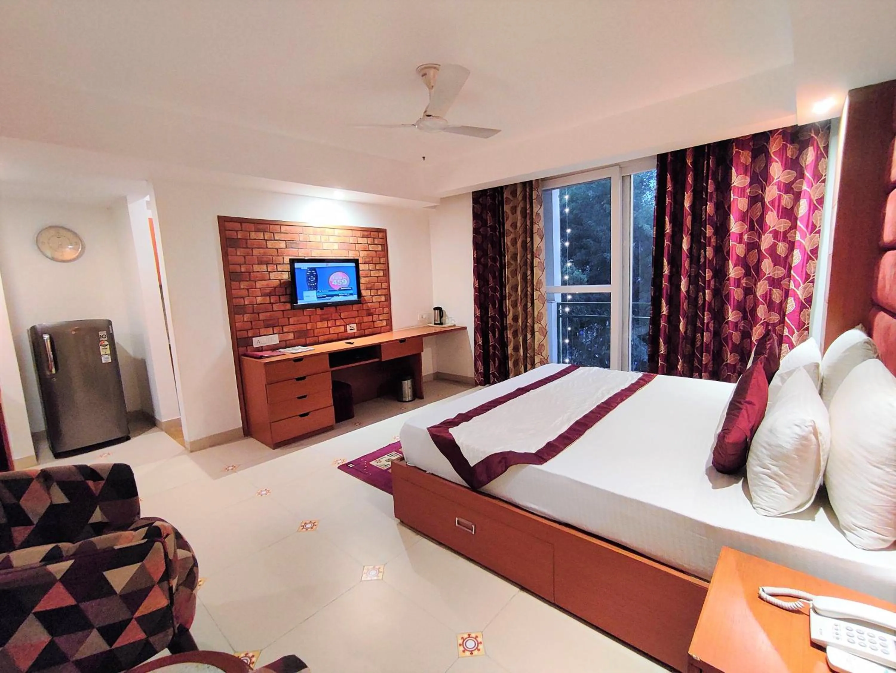 Photo of the whole room, Bed in The Angel Hotel & Suites near Medanta