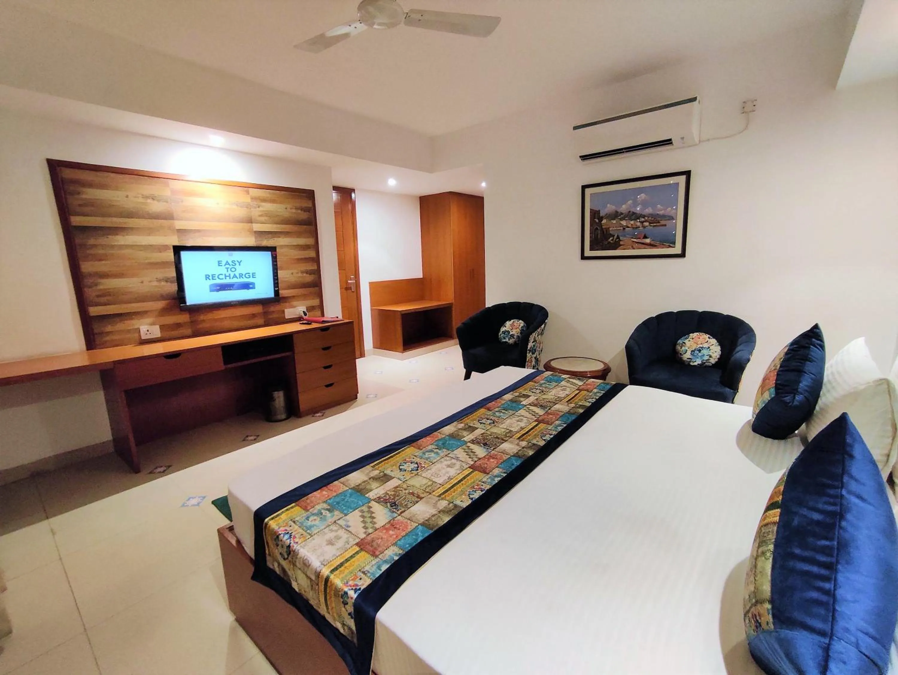 Photo of the whole room, Bed in The Angel Hotel & Suites near Medanta