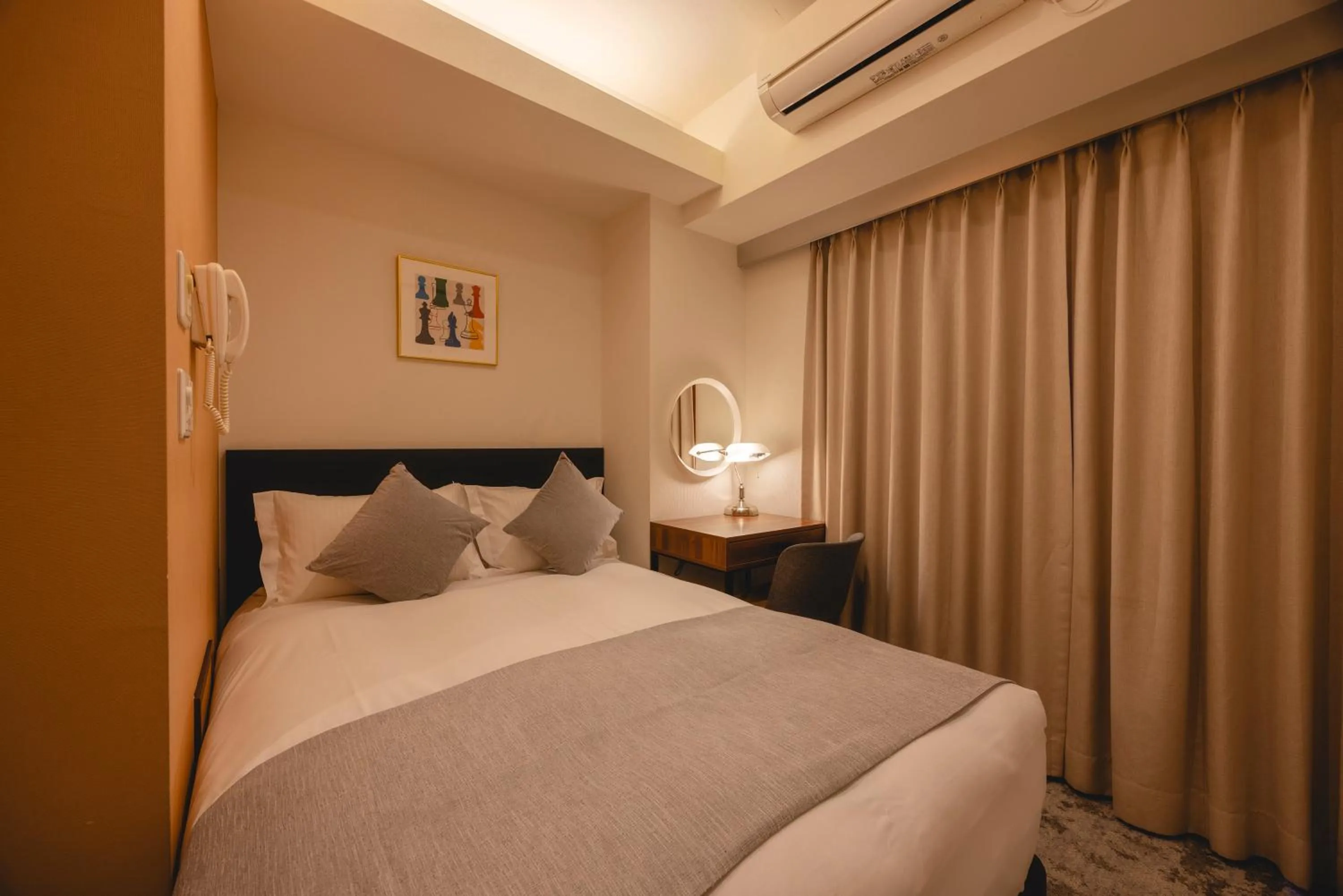 Bed in Centurion Hotel Residential Akasaka Station