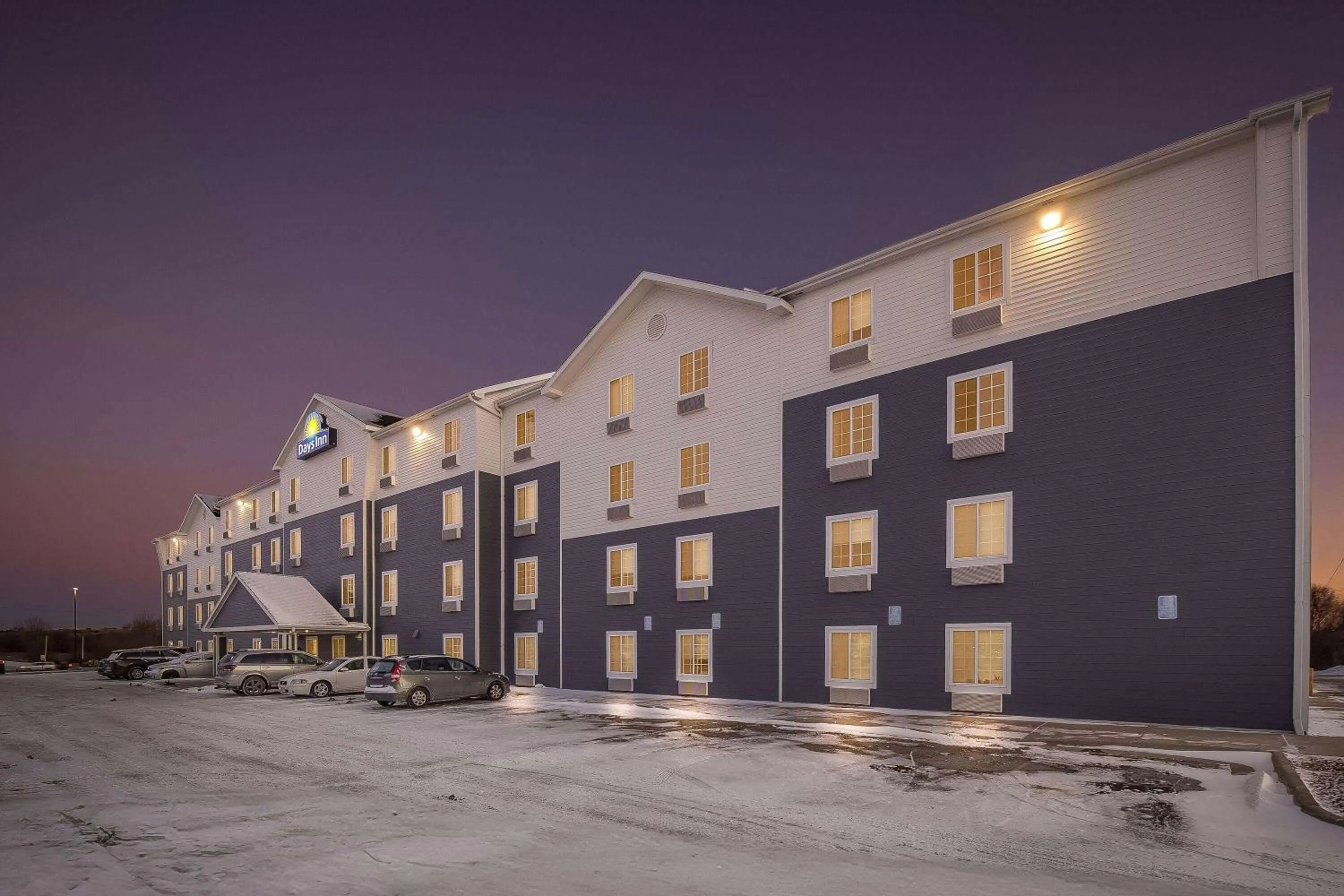 Property building in Days Inn & Suites by Wyndham Rochester South
