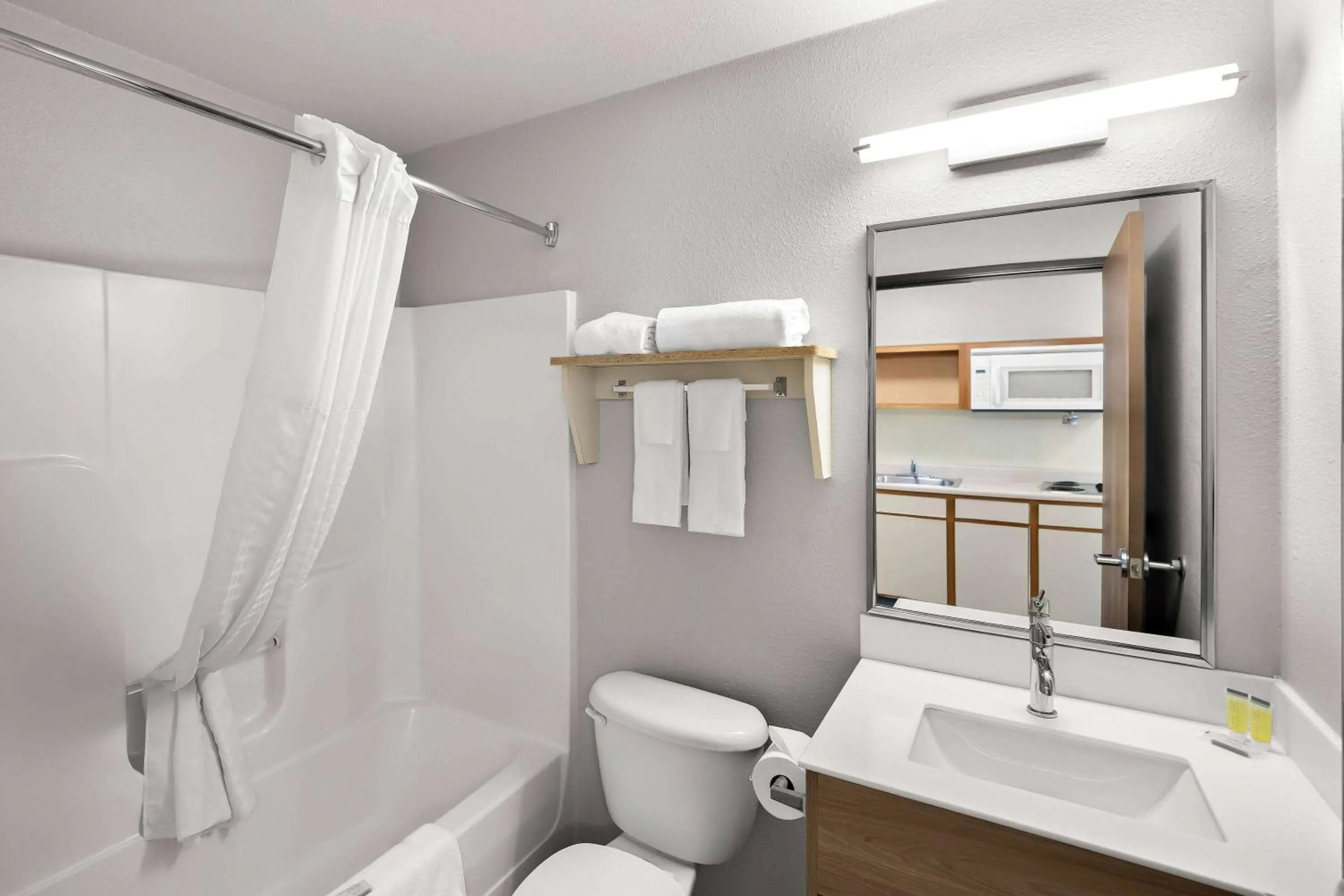 Bathroom in Days Inn & Suites by Wyndham Rochester South