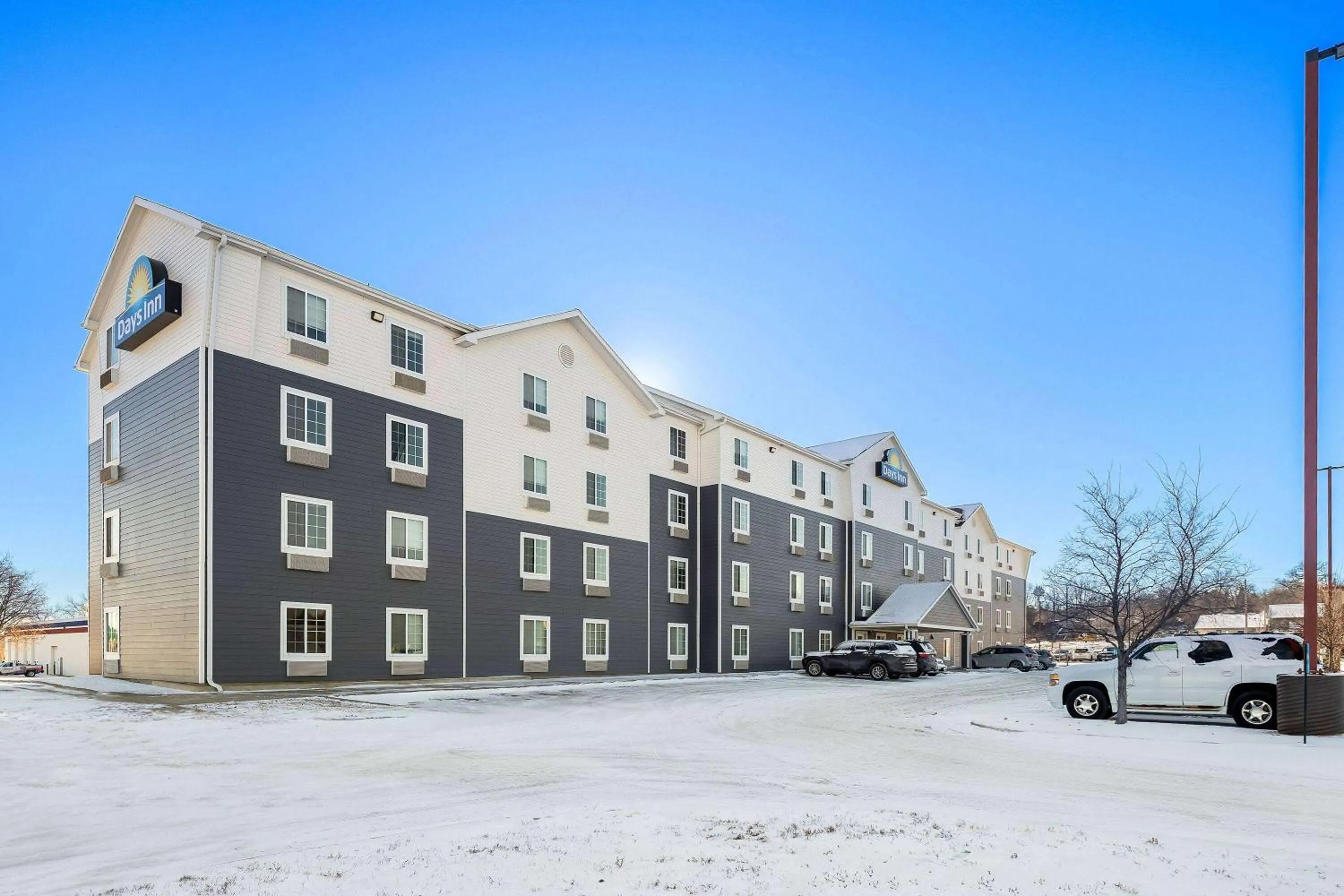 Property building in Days Inn & Suites by Wyndham Rochester South