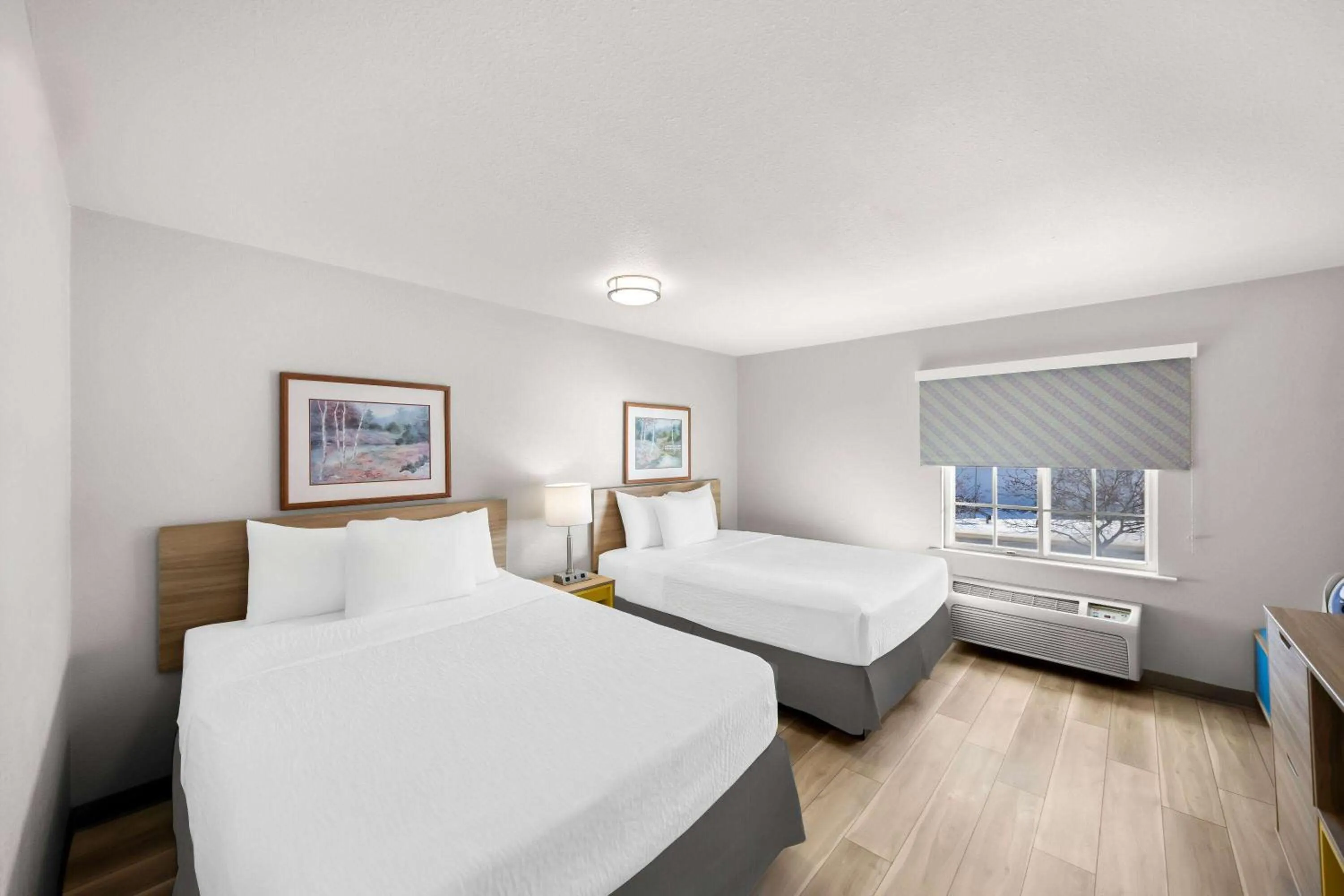 Bed in Days Inn & Suites by Wyndham Rochester South