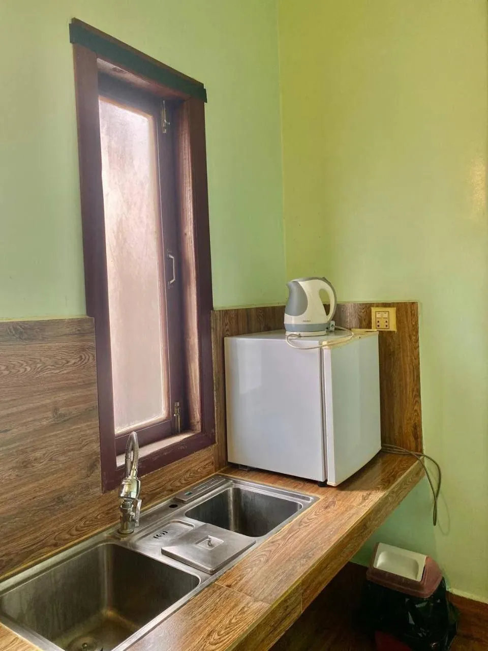 Kitchen or kitchenette in The Coconut House Hotel