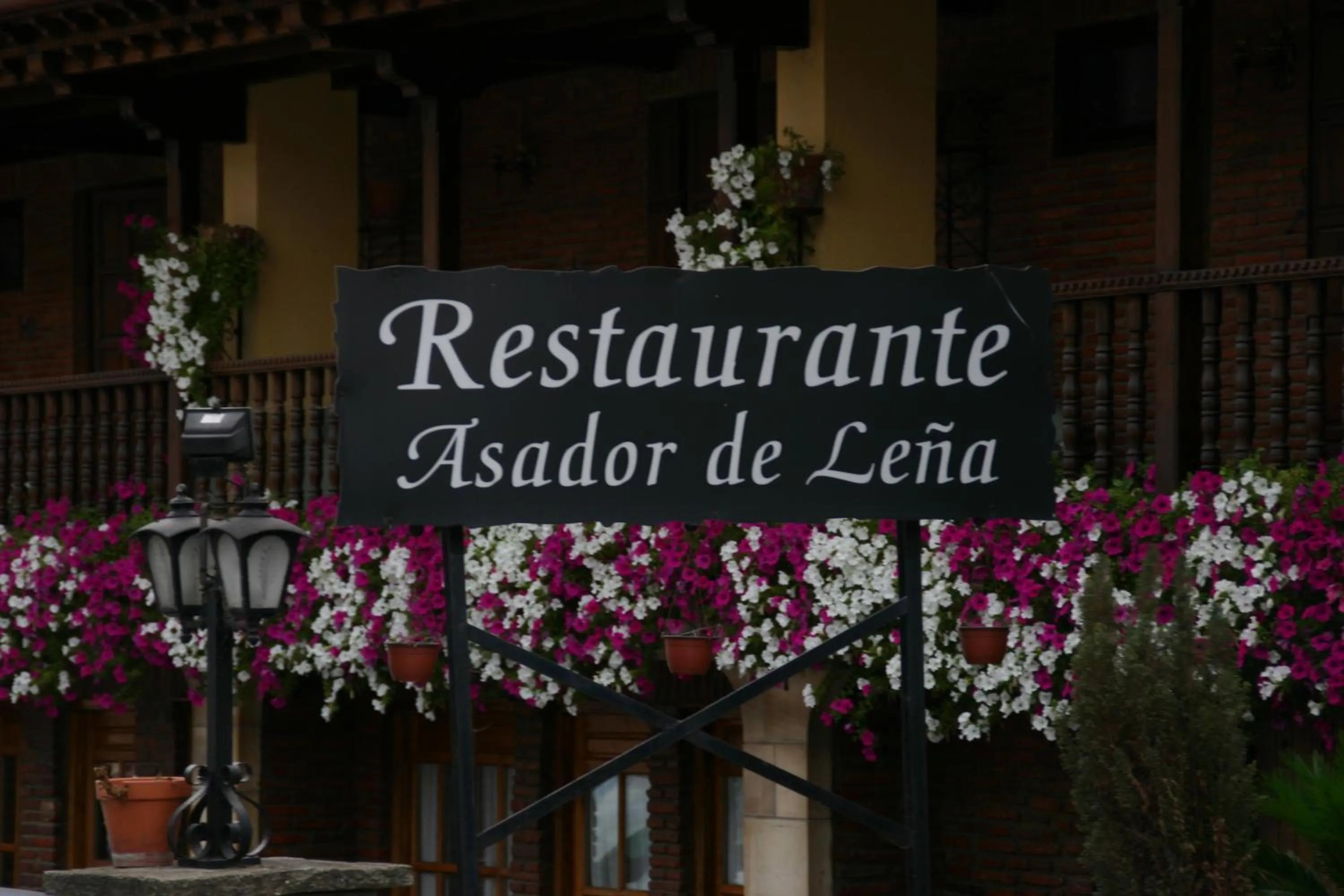 Property logo or sign in Hosteria Peña Sagra