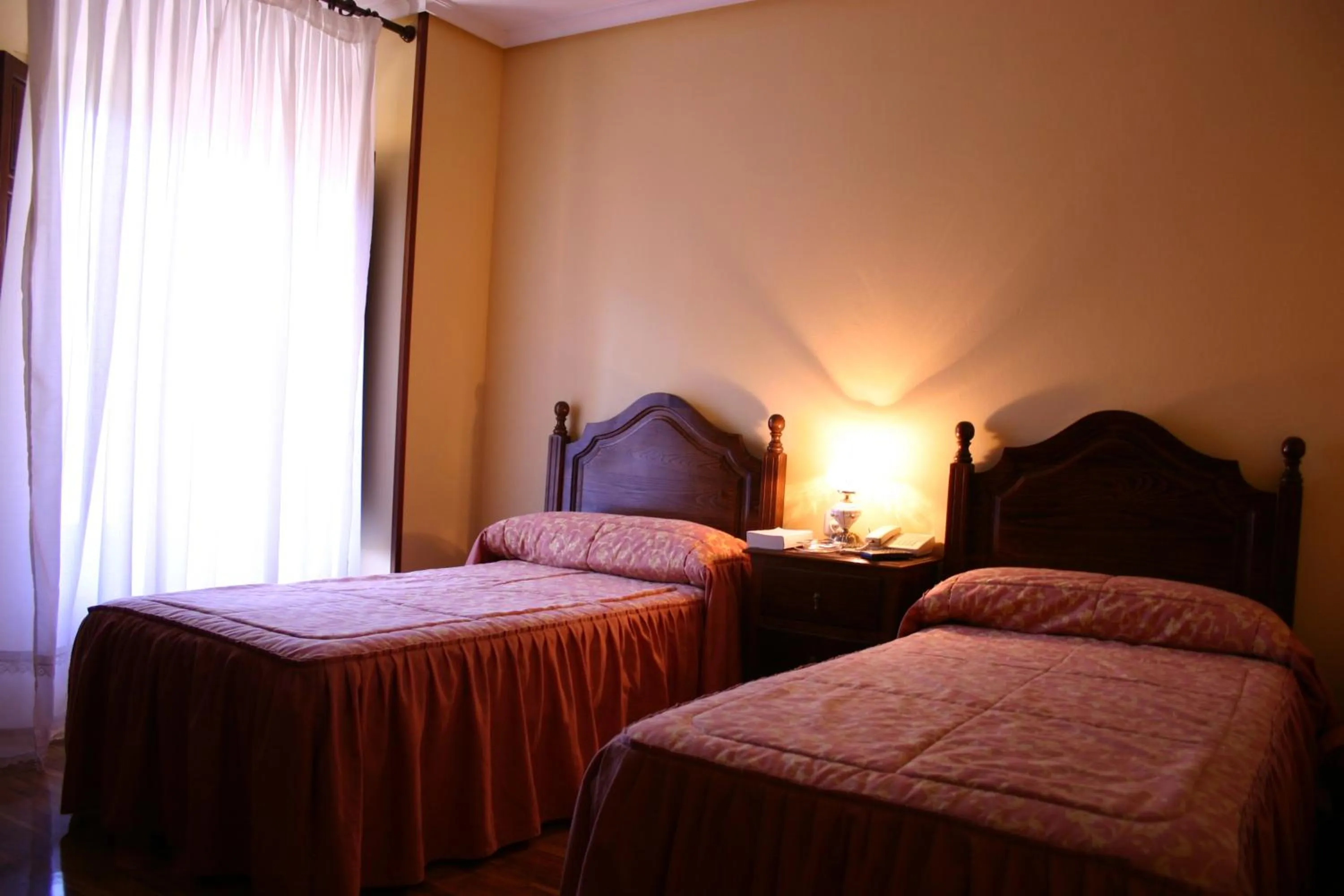 Photo of the whole room, Bed in Hosteria Peña Sagra