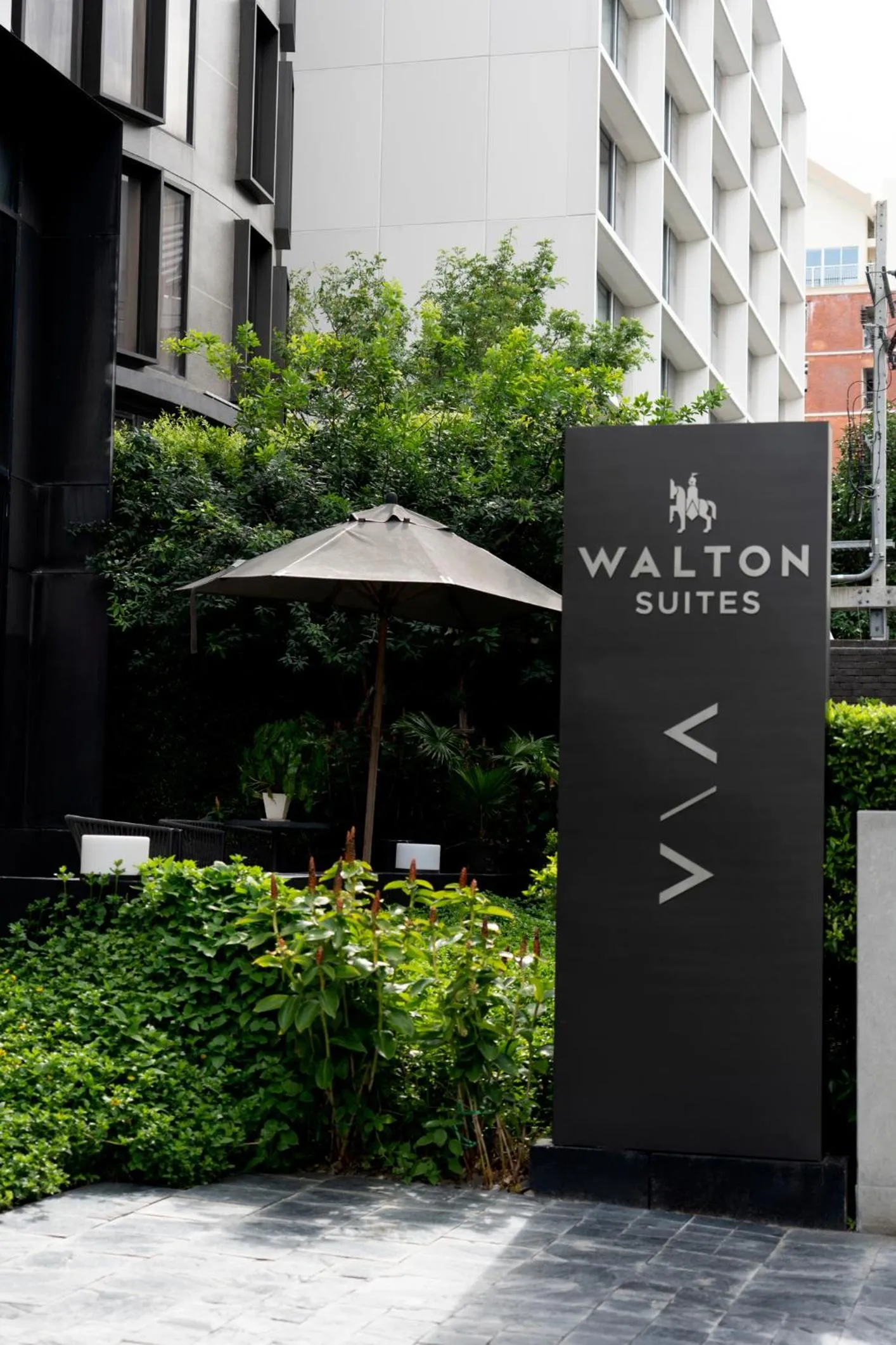 Property logo or sign in Walton Suites Sukhumvit