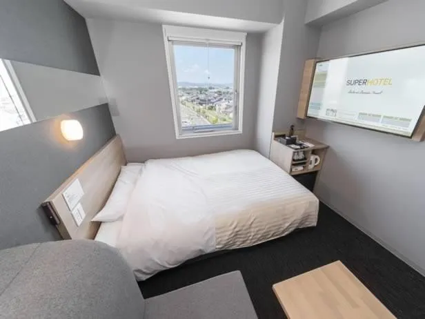 Bed in Super Hotel Mitazono Sendai Airport