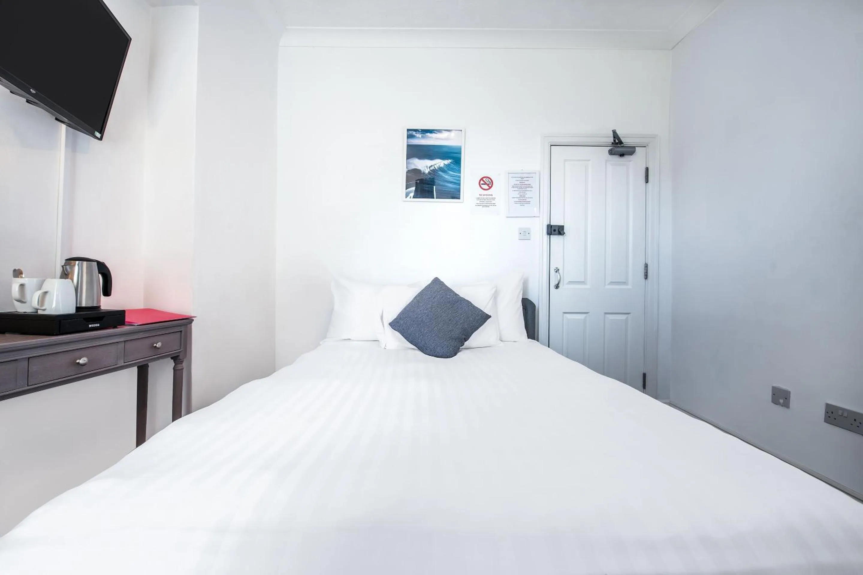 Bedroom, Bed in OYO Pier Hotel