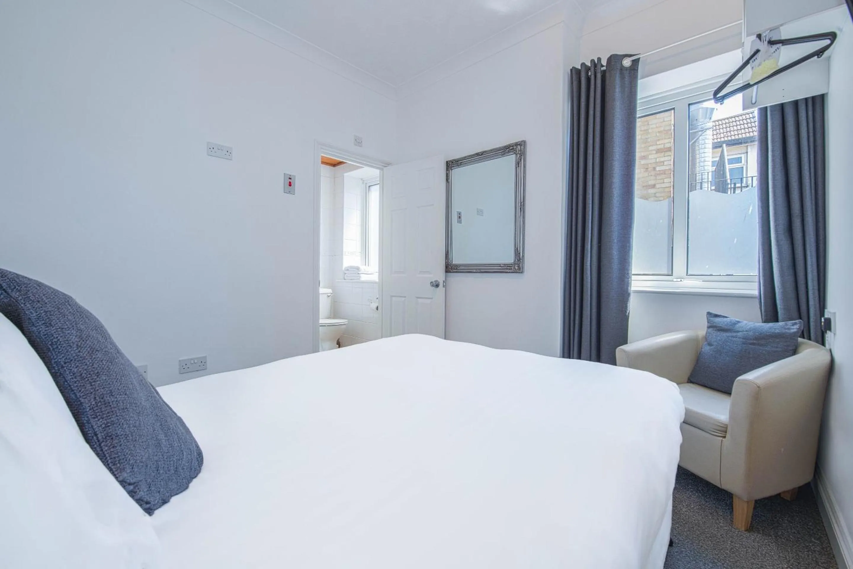 Bedroom, Bed in OYO Pier Hotel