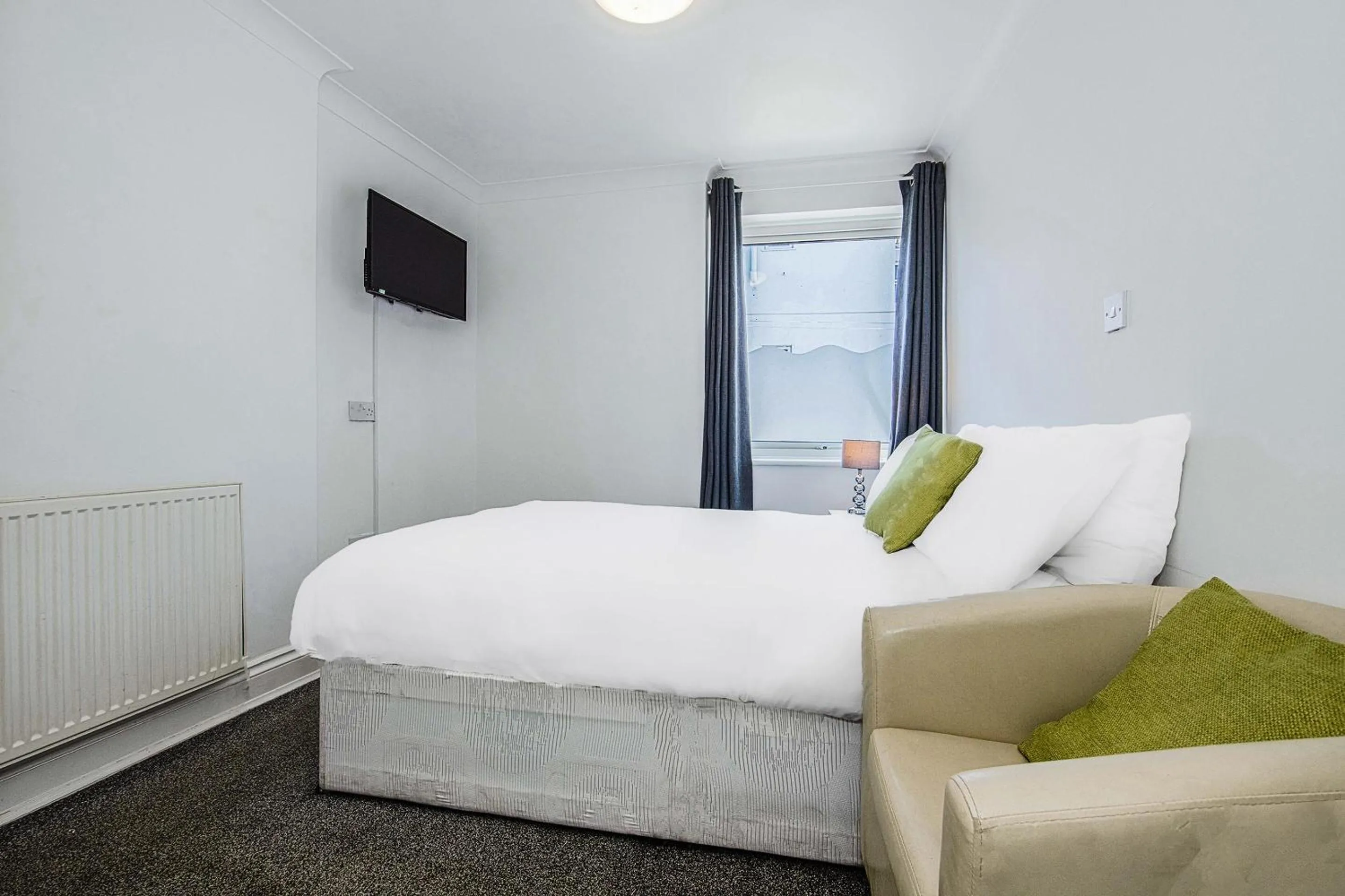 Bedroom, Bed in OYO Pier Hotel