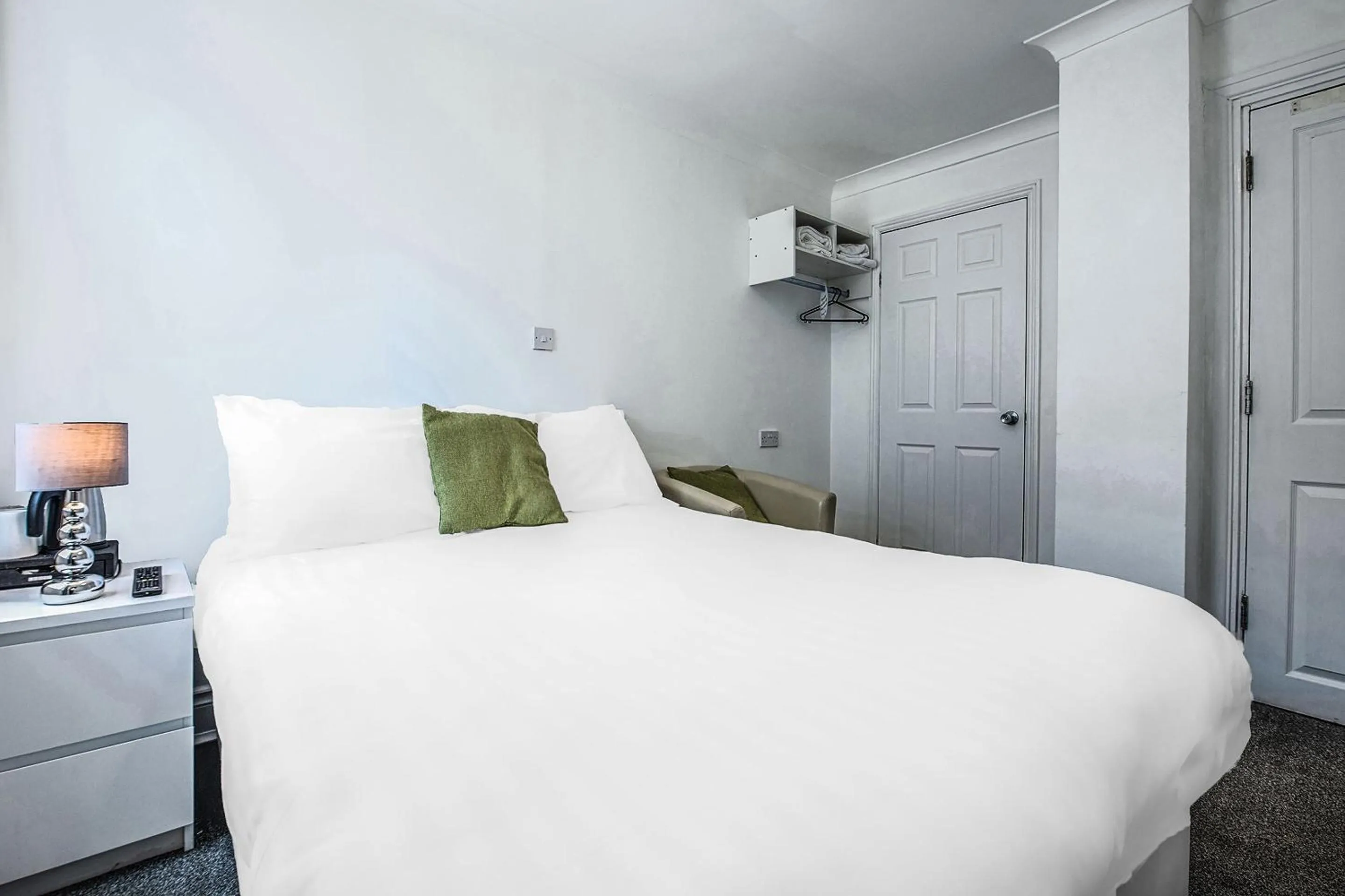 Bedroom, Bed in OYO Pier Hotel