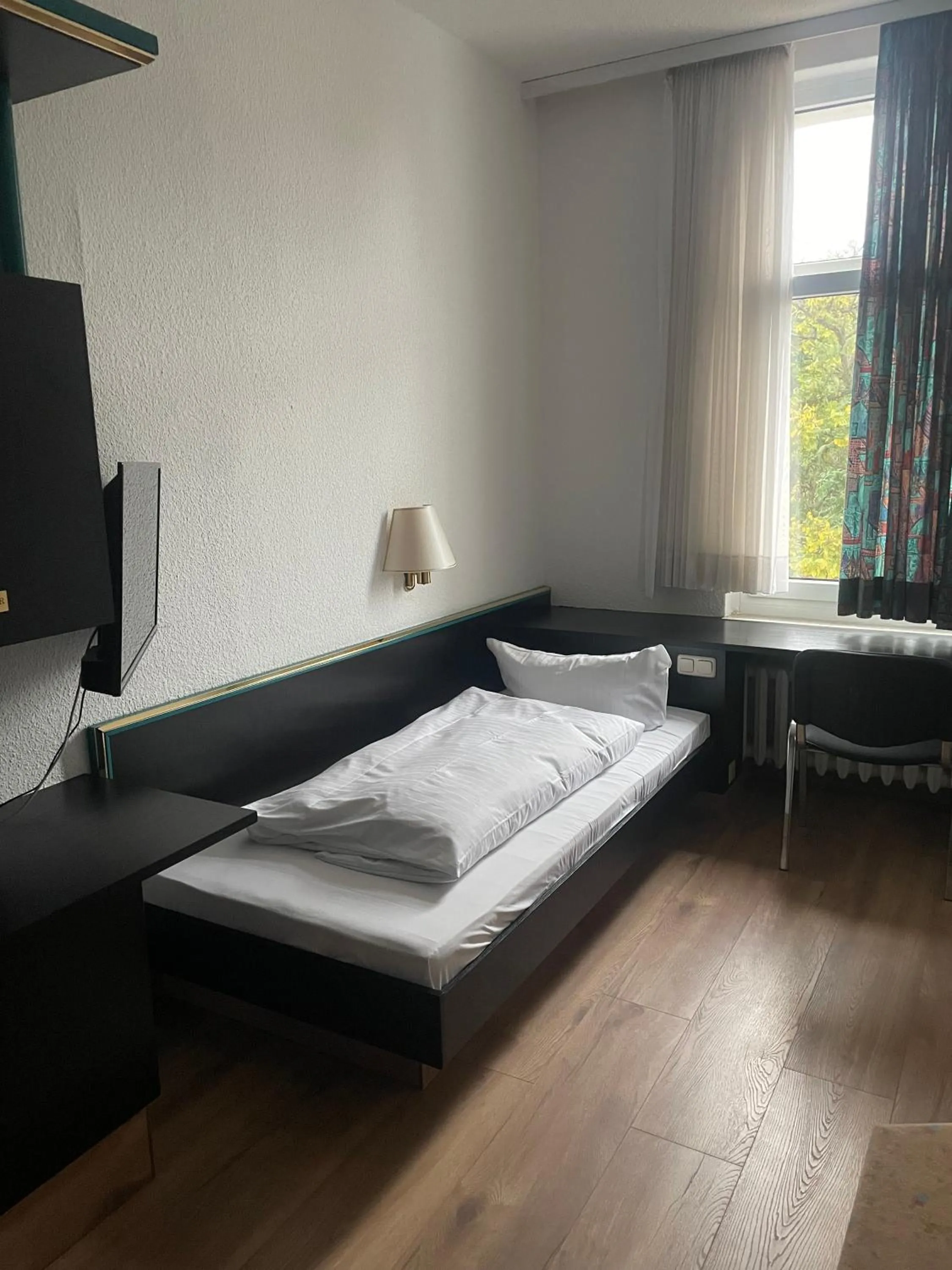 Bed in Hotel Bitterfelder Hof