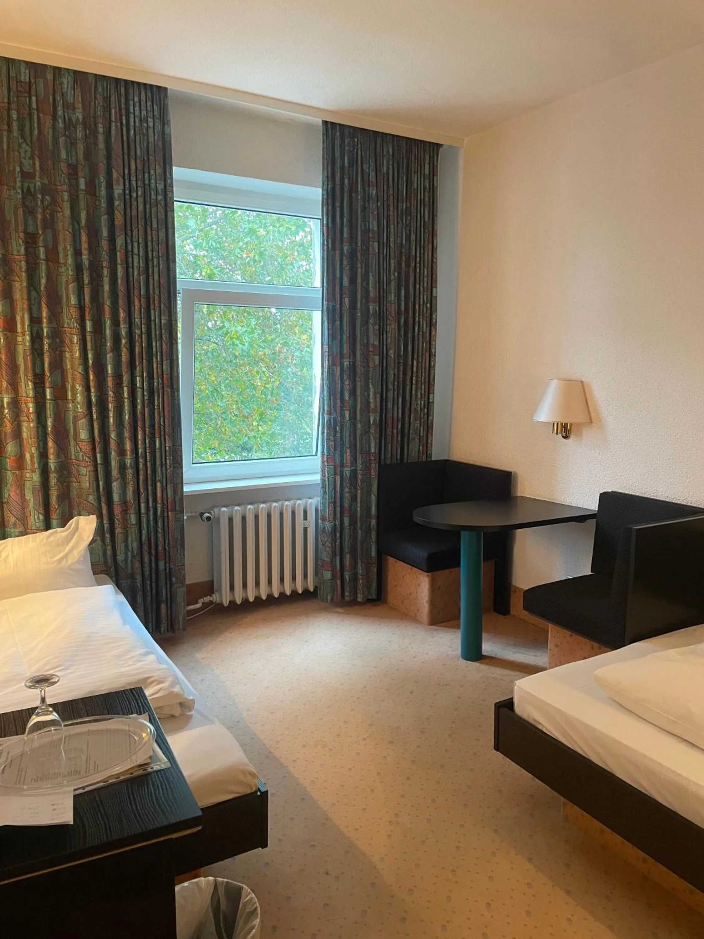 Photo of the whole room, Bed in Hotel Bitterfelder Hof