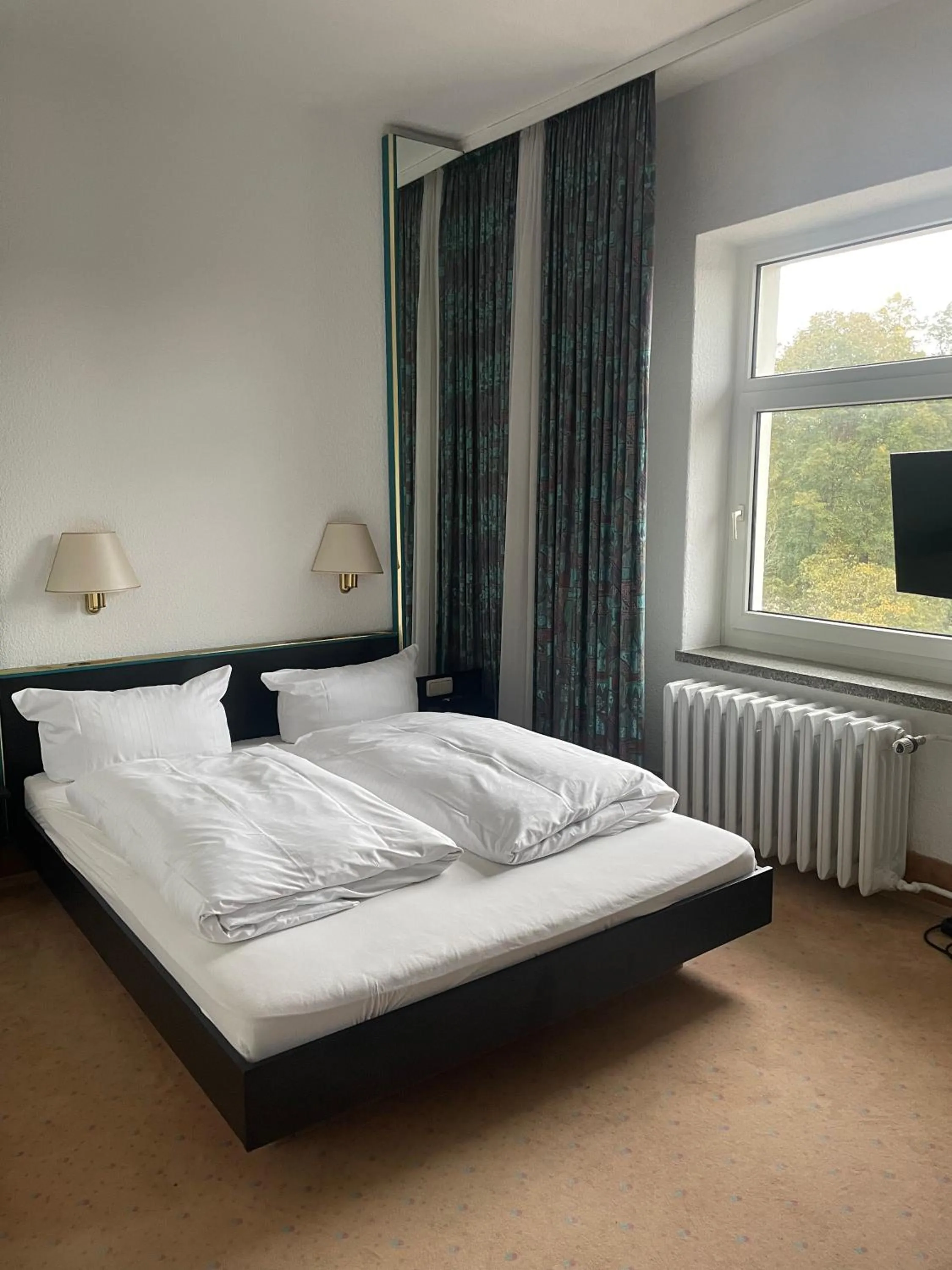 Bed in Hotel Bitterfelder Hof