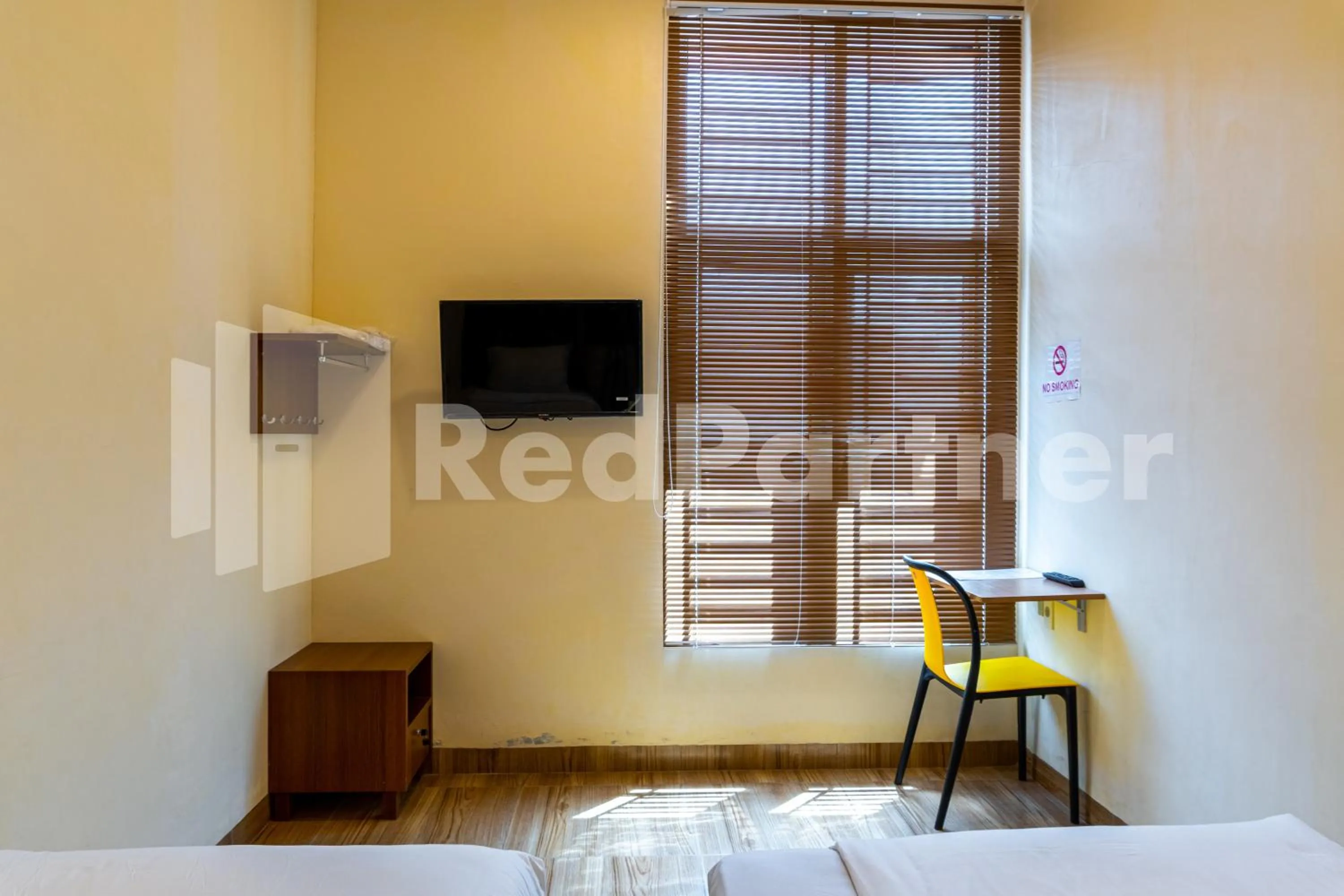 Bedroom, Bed in Adam Malik Guesthouse near Regale ICC Medan Mitra RedDoorz