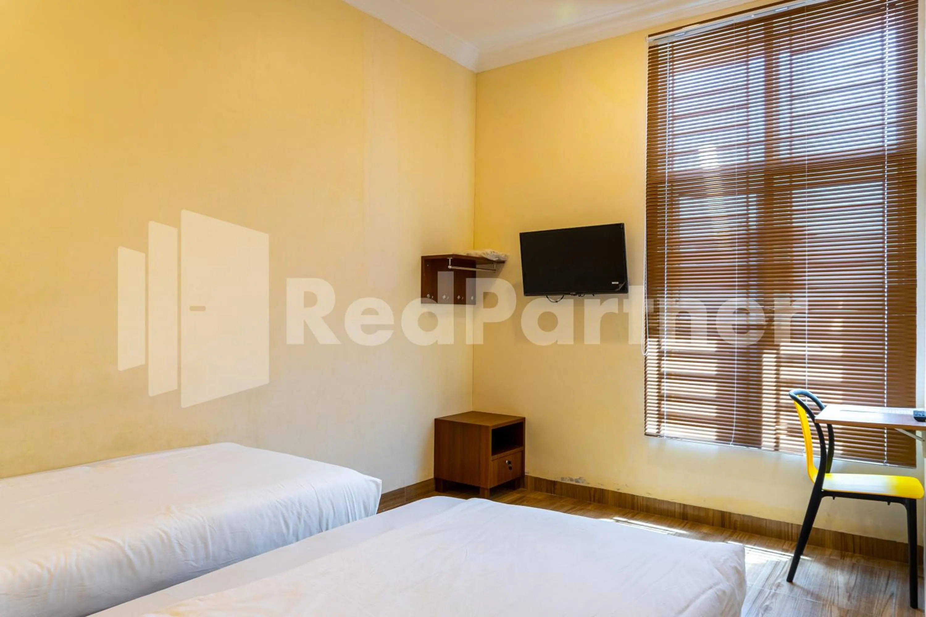 Bedroom, Bed in Adam Malik Guesthouse near Regale ICC Medan Mitra RedDoorz